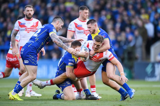 Mark Percival of St. Helens whilst under pressure during the Betfred Super League play-off Eliminator 2 Warrington Wolves v St Helens at Halliwell Jones Stadium, Warrington, United Kingdom, 28th September 2024

(Photo by Ben Roberts/News Images)