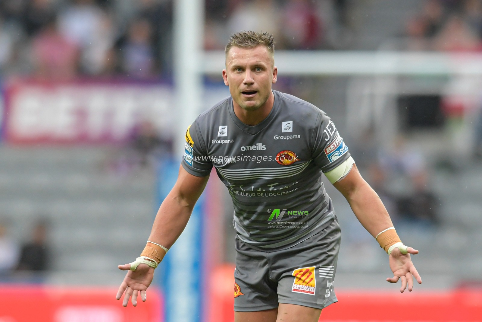Josh Drinkwater (7) of Catalans Dragons gives instructions during the game