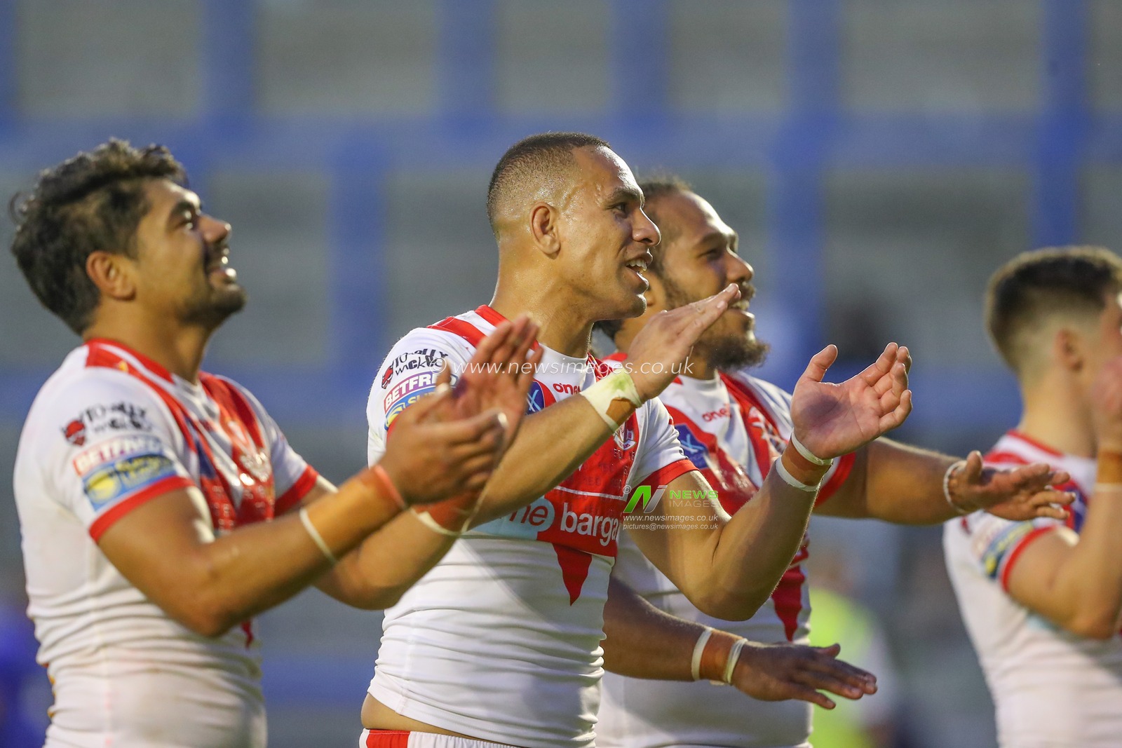 St Helens players celebrate their teams win after the Betfred Super League Round 18 match Warrington Wolves vs St Helens at Halliwell Jones Stadium, Warrington, United Kingdom, 7th July 2023

(Photo by Gareth Evans/News Images)
