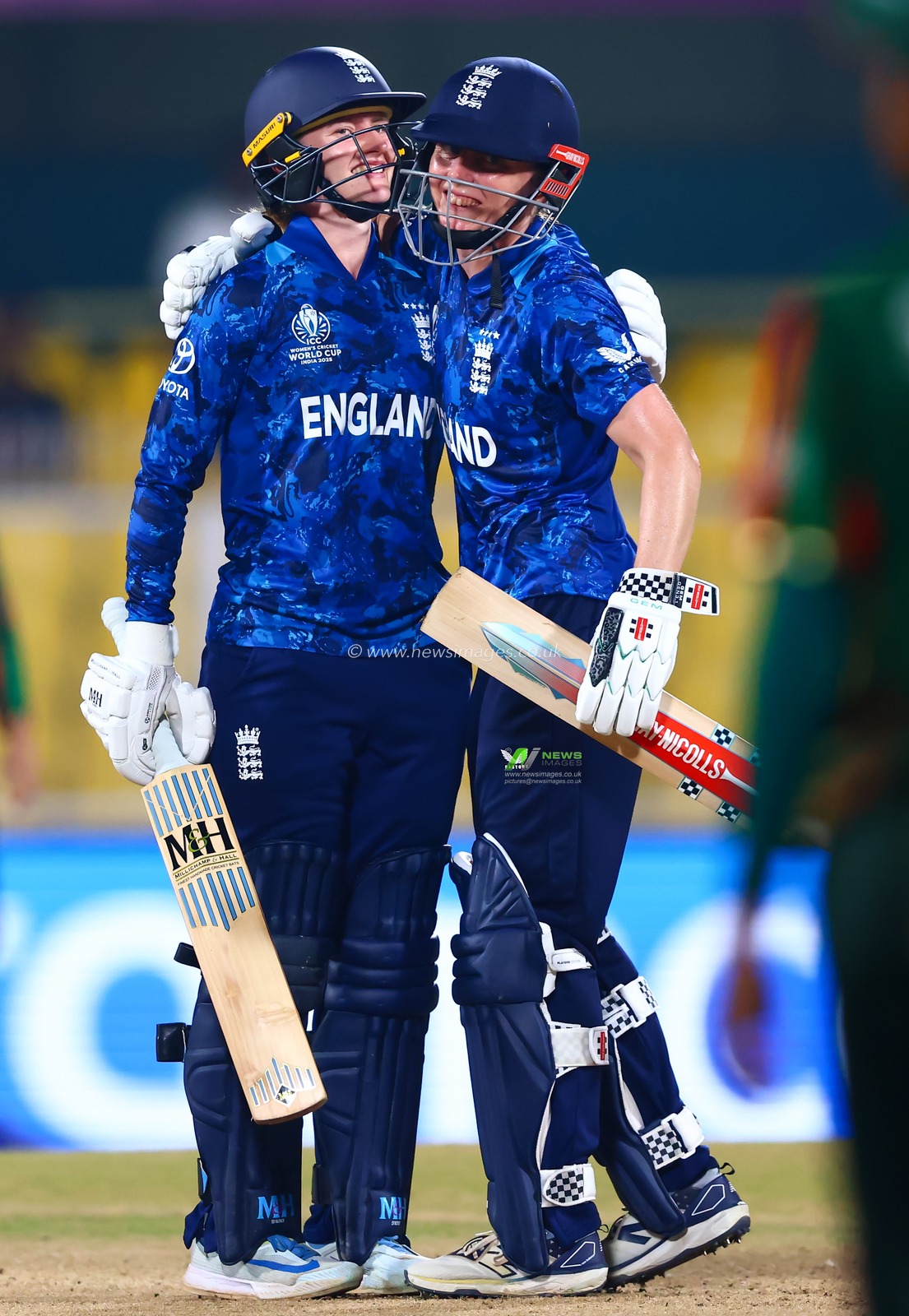 Heather Knight of England and Charlie Dean of England win's the match during the ICC Women's World Cup match England Women vs Bangladesh Women at ACA Barsapara Cricket Stadium, Guwahati, Assam/ India, 7th October 2025

(Photo by Shubhajit Roy Karmakar/News Images)