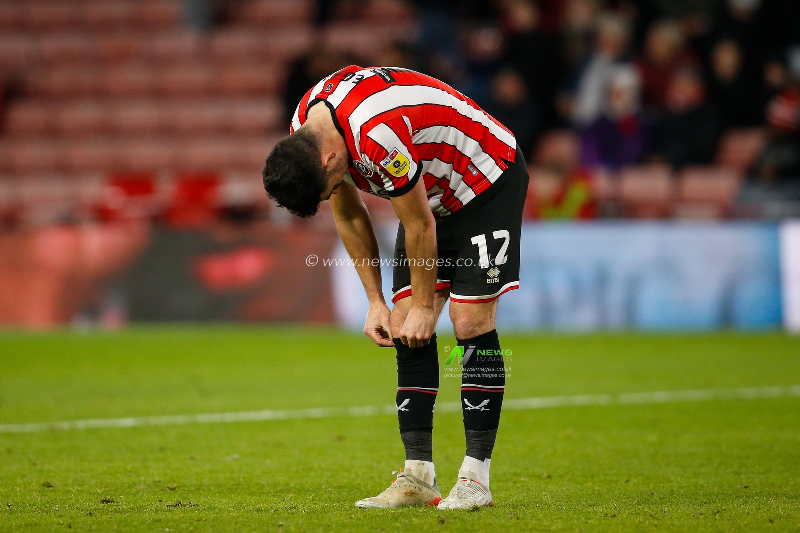 John Egan #12 of Sheffield United looking dejected during the Sky Bet Championship match Sheffield United vs Rotherham United at Bramall Lane, Sheffield, United Kingdom, 8th November 2022

(Photo by Ben Early/News Images)