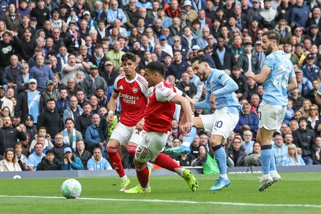 Rayan Cherki of Manchester City scores to make it 1-0 during the Premier League match Manchester City vs Arsenal at Etihad Stadium, Manchester, United Kingdom on 19 April 2026

(Photo by Mark Cosgrove/News Images)