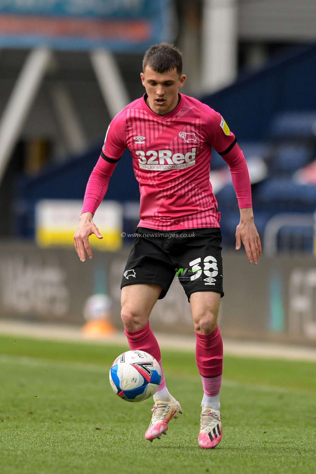 Jason Knight #38 of Derby County looks to control the ball