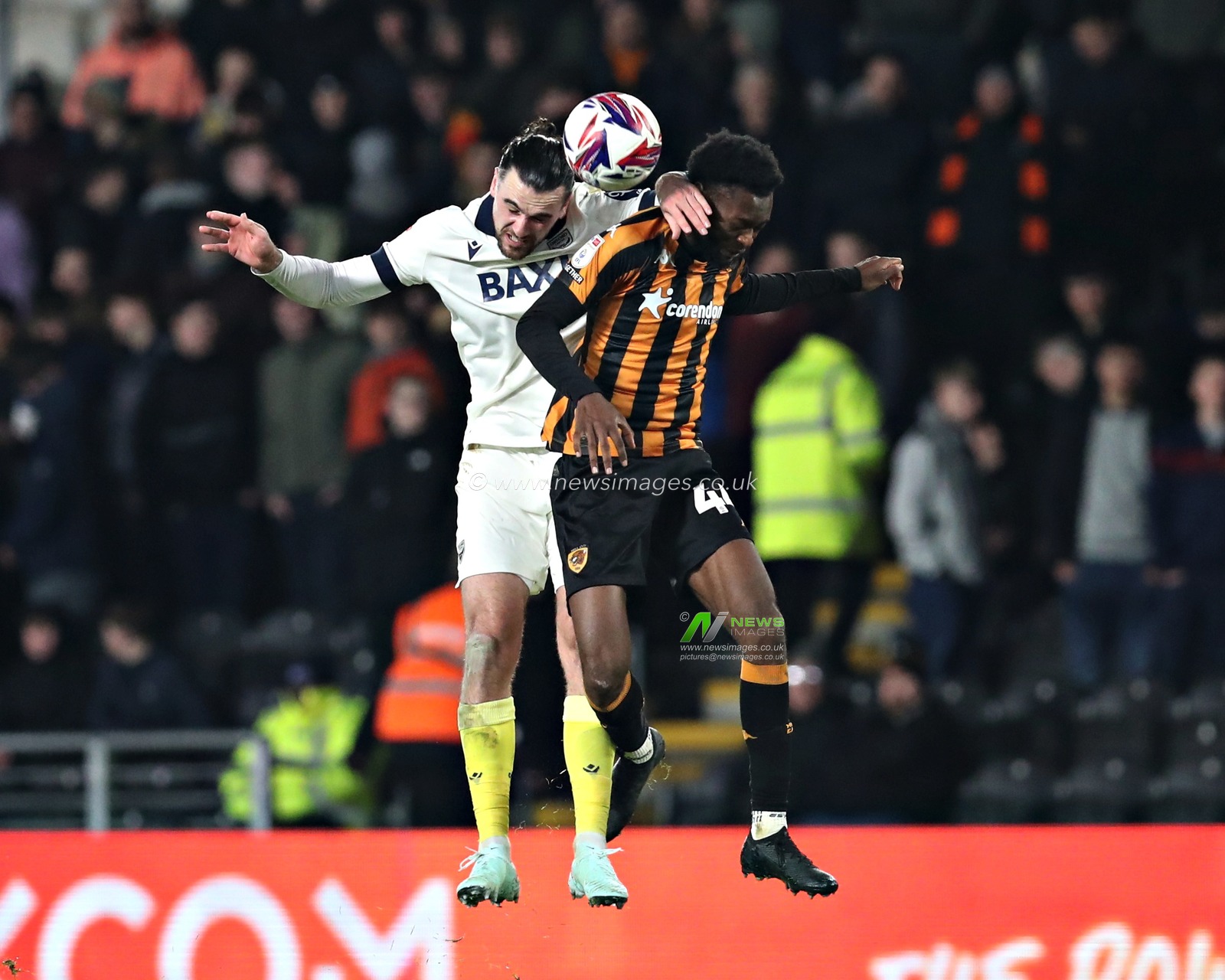 Abu Kamara of Hull City battles with Ciaron Brown of Oxford United during the Sky Bet Championship match Hull City vs Oxford United at MKM Stadium, Hull, United Kingdom, 12th March 2025

(Photo by Sam Eaden/News Images)