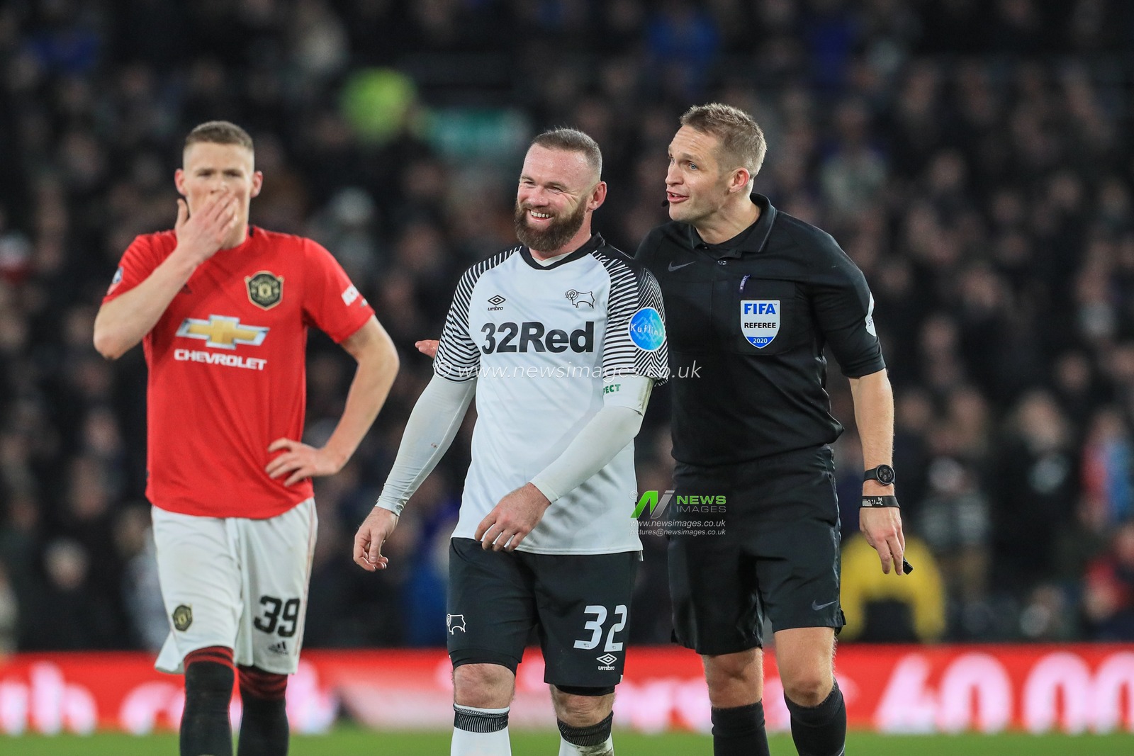 5th March 2020, Pride Park Stadium, Derby, England; Emirates FA Cup 5th Round, Derby County v Manchester United : Wayne Rooney (32) of Derby County laughs with referee Craig Pawson