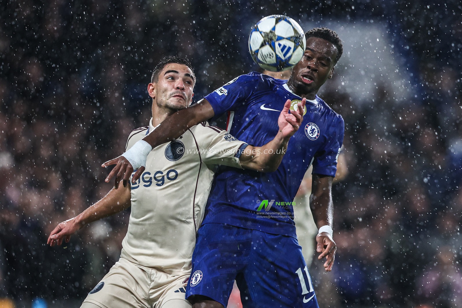 Lucas Rosa of Ajax and Jamie Gittens of Chelsea battle for the ball during the UEFA Champions League Matchday 3 of 8 Chelsea vs Ajax at Stamford Bridge, London, United Kingdom, 22nd October 2025

(Photo by Alfie Cosgrove/News Images)