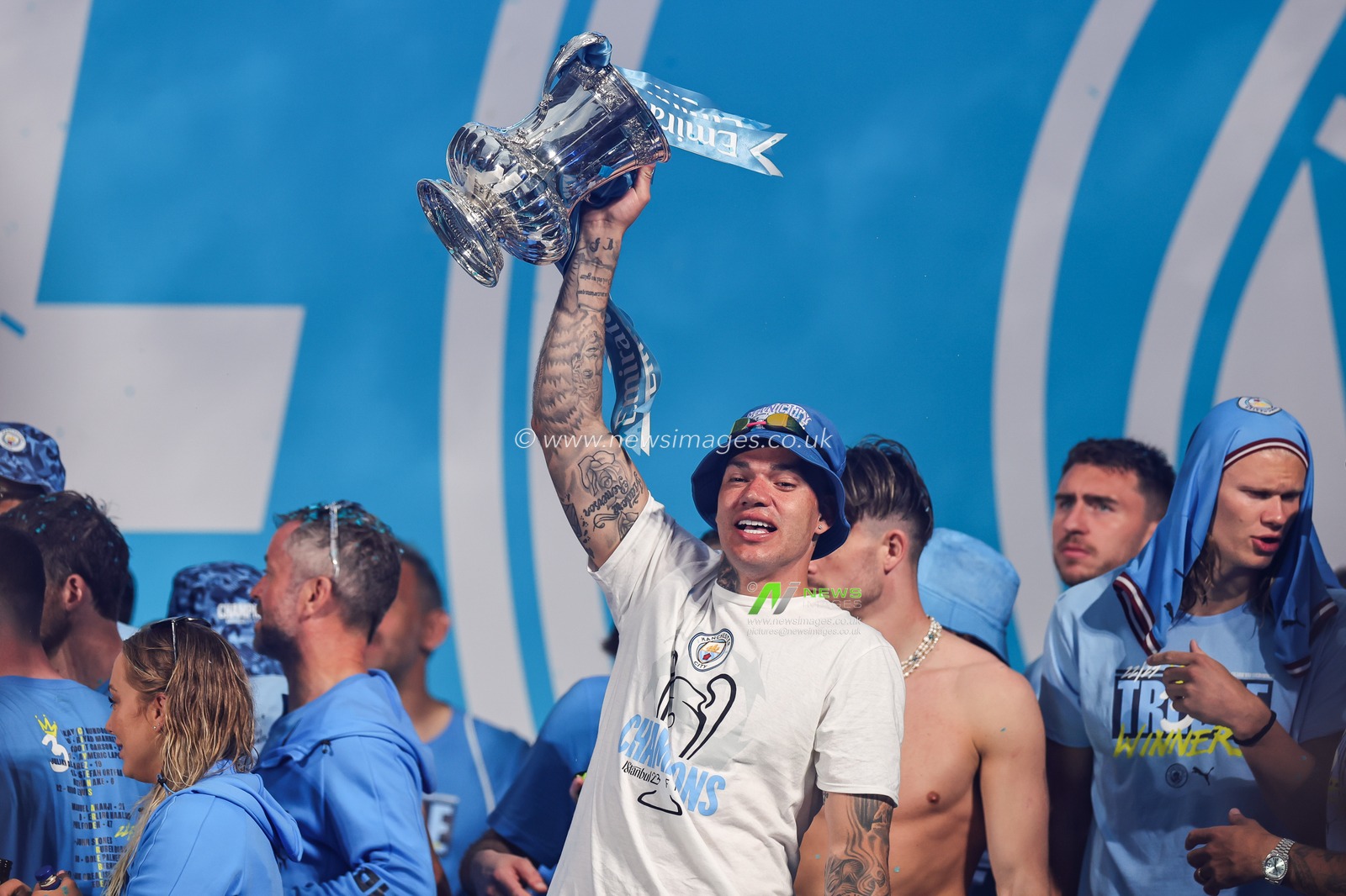 Ederson #31 of Manchester City lifts the Champions league Trophy during Manchester City's Treble victory parade at St Peterâ€™s Square, Manchester, United Kingdom, 12th June 2023

(Photo by Mark Cosgrove/News Images)