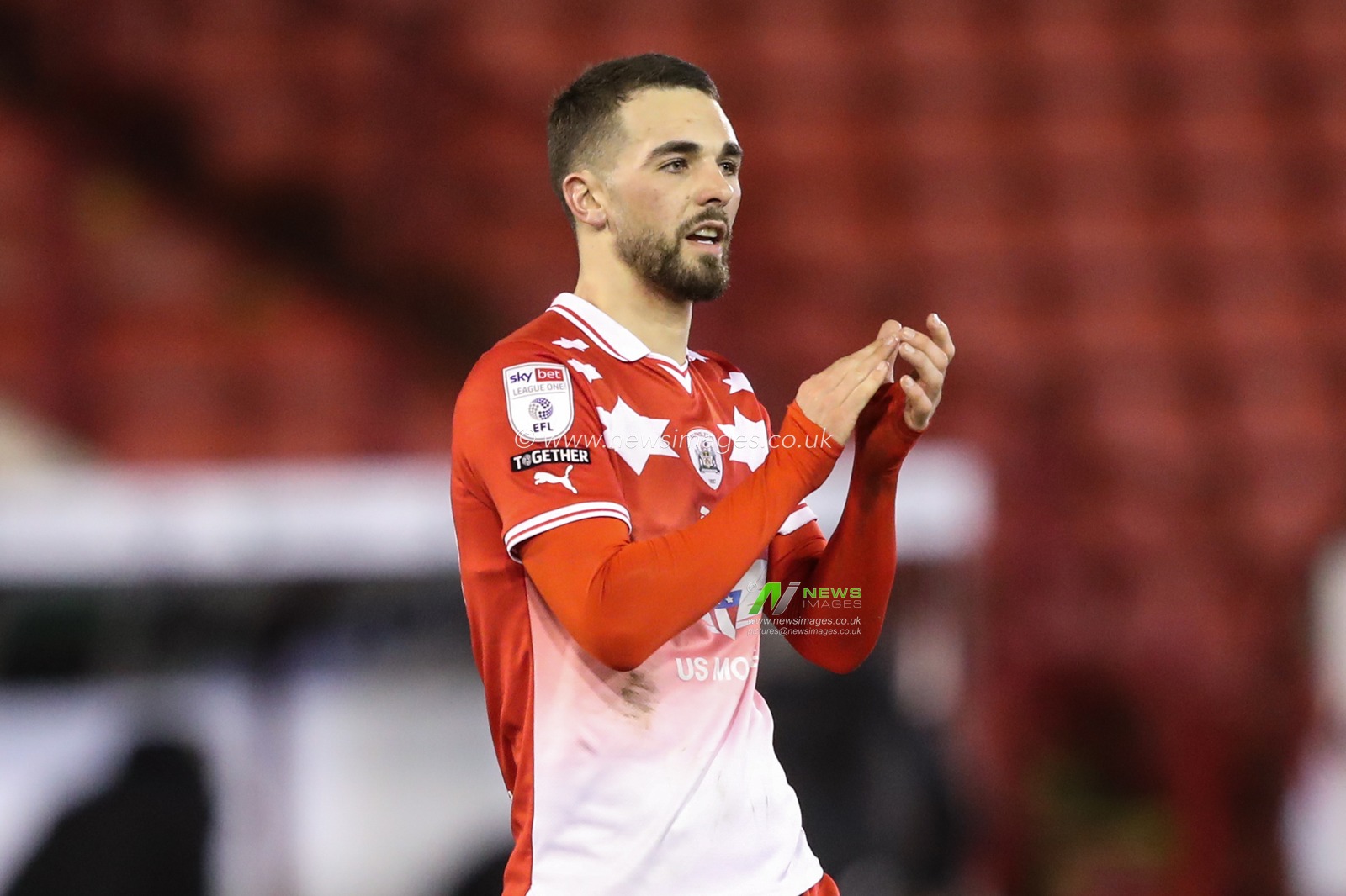 Adam Phillips of Barnsley applauds the home fans after a 2-1 win during the Sky Bet League 1 match Barnsley vs Carlisle United at Oakwell, Barnsley, United Kingdom, 16th January 2024

(Photo by Alfie Cosgrove/News Images)