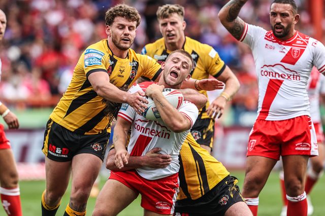 Mikey Lewis of Hull KR is tackled during the Betfred Super League round 21 match Hull KR vs Castleford Tigers at Sewell Group Craven Park, Kingston upon Hull, United Kingdom, 9th August 2025

(Photo by Alfie Cosgrove/News Images)