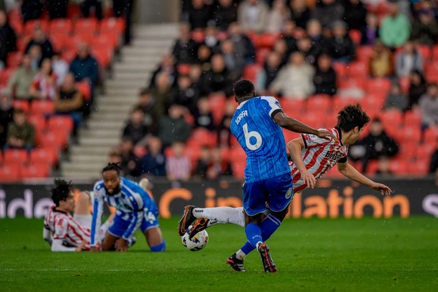 Tatsuki Seko of Stoke City is tackled by  Dominic Iorfa of Sheffield Wednesday during the Sky Bet Championship match Stoke City vs Sheffield Wednesday at Bet365 Stadium, Stoke On Trent, United Kingdom on 03 April 2026

(Photo by Maynard Manyowa/News Images)