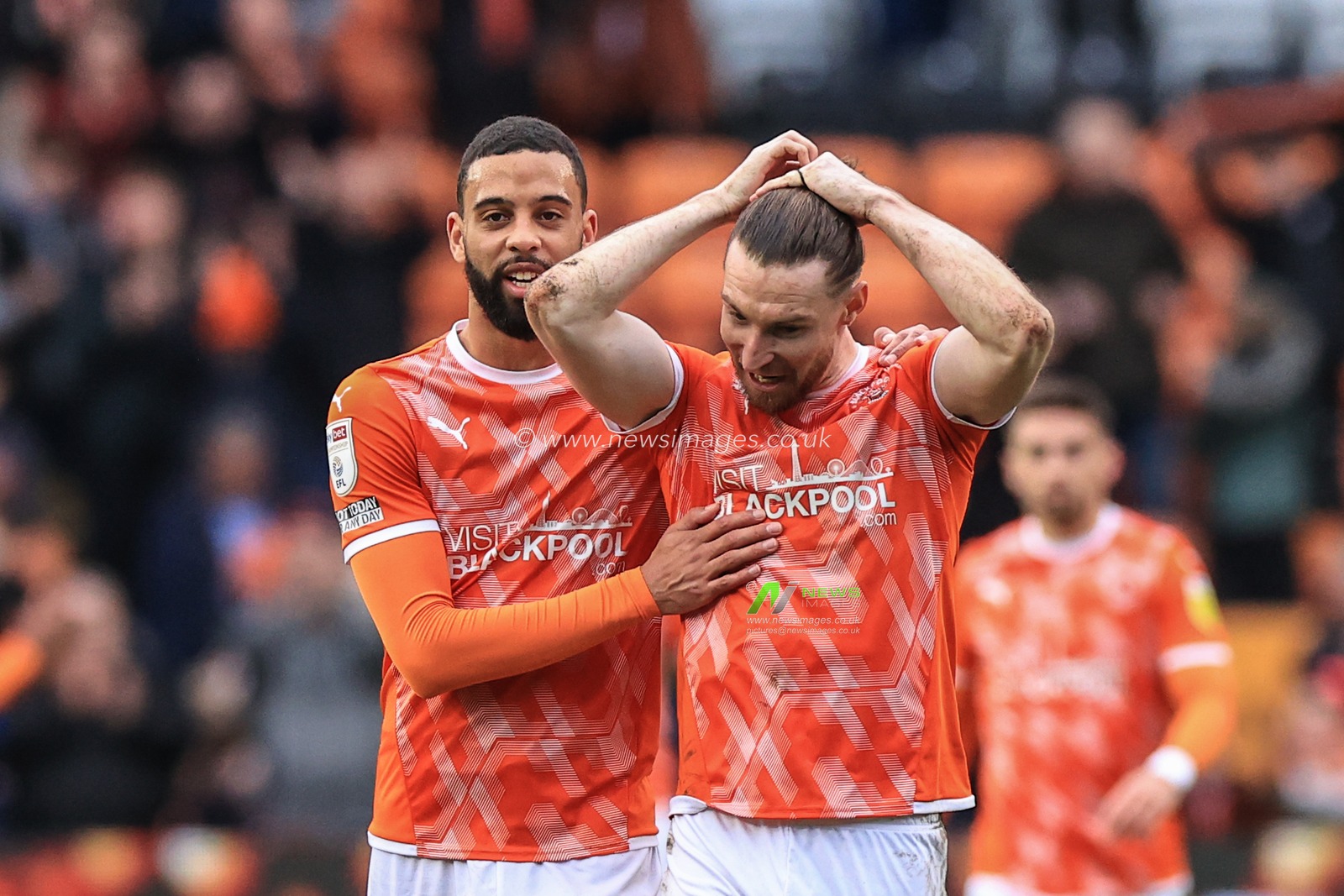 CJ Hamilton #22 of Blackpool and James Husband #3 of Blackpool celebrate Blackpools 1-0 win