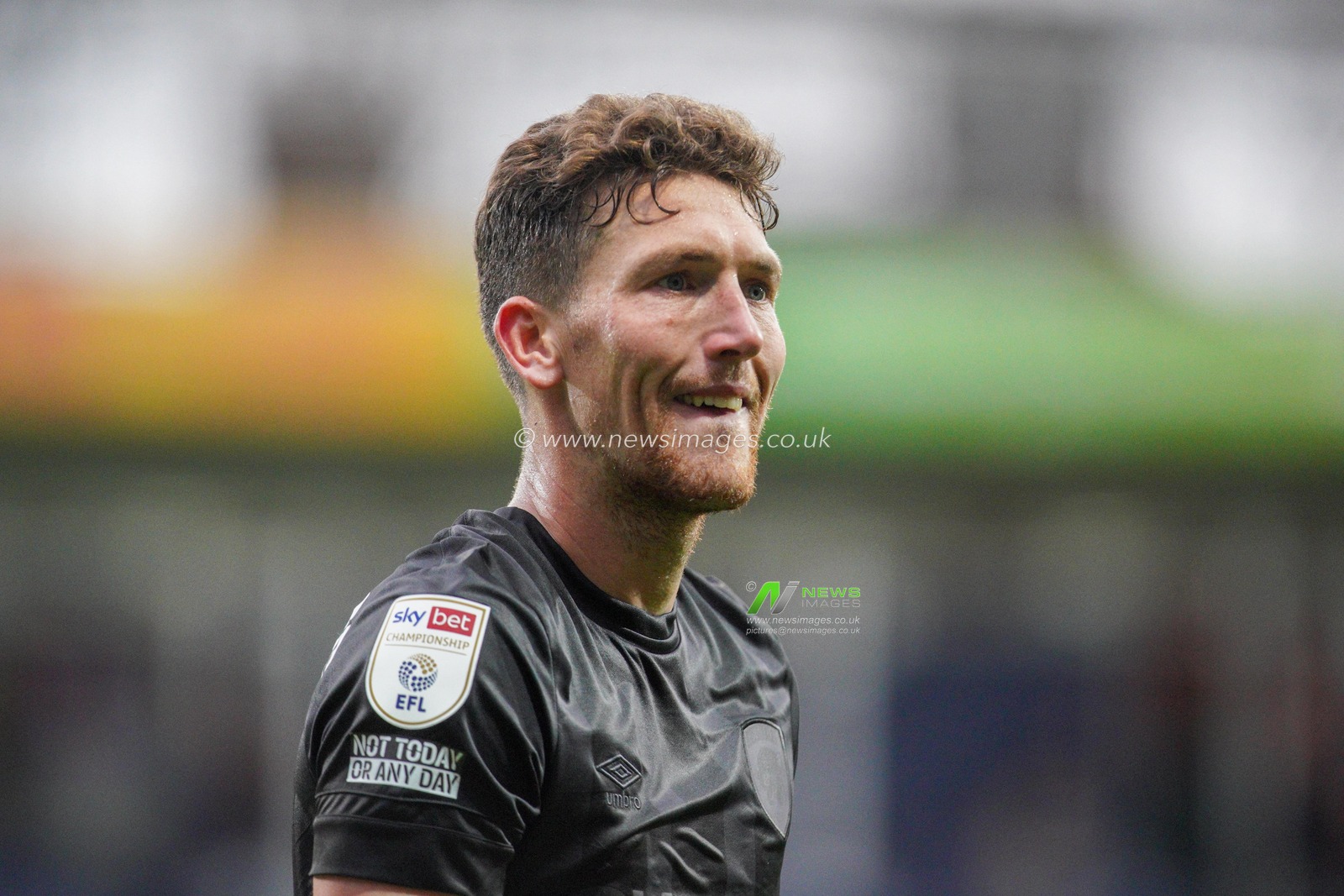 Richard Smallwood #6 of Hull City walks off at the end of the game