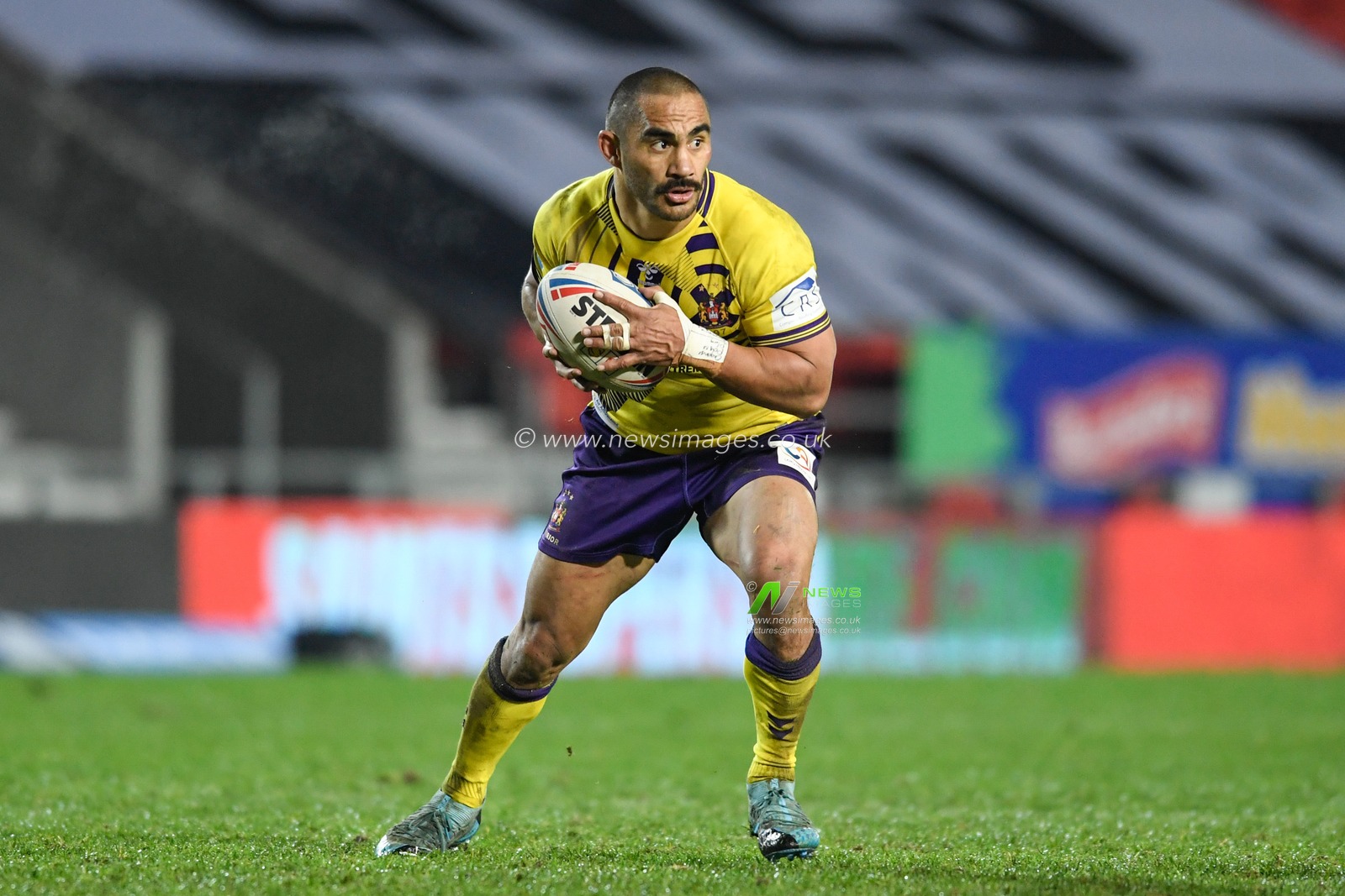 Thomas Leuluai (7) of Wigan Warriors looks for a pass