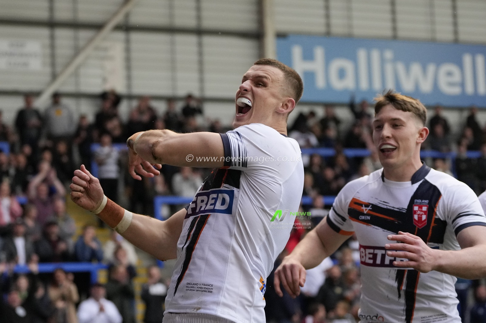Ash Handley #2 of England celebrates after scoring a tryduring the Mid Season International match England vs France at Halliwell Jones Stadium, Warrington, United Kingdom, 29th April 2023

(Photo by Steve Flynn/News Images)