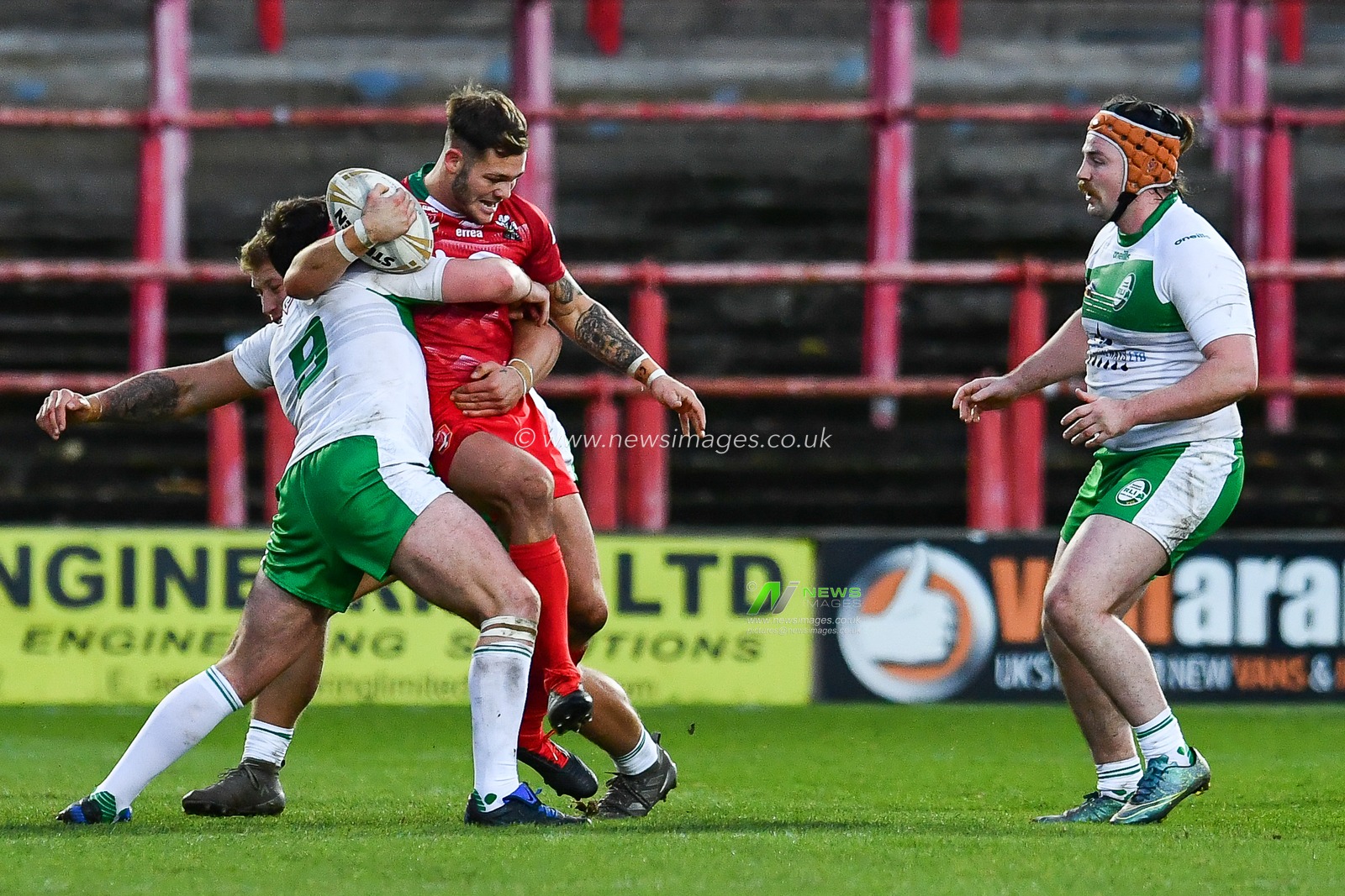 11th November 2018 , Racecourse Ground,  Wrexham, Wales ;  Rugby League World Cup Qualifier,Wales v Ireland ; Mike Butt of Wales is tackled by Declan Oâ€™Donnell of Ireland 


Credit:   Craig Thomas/News Images