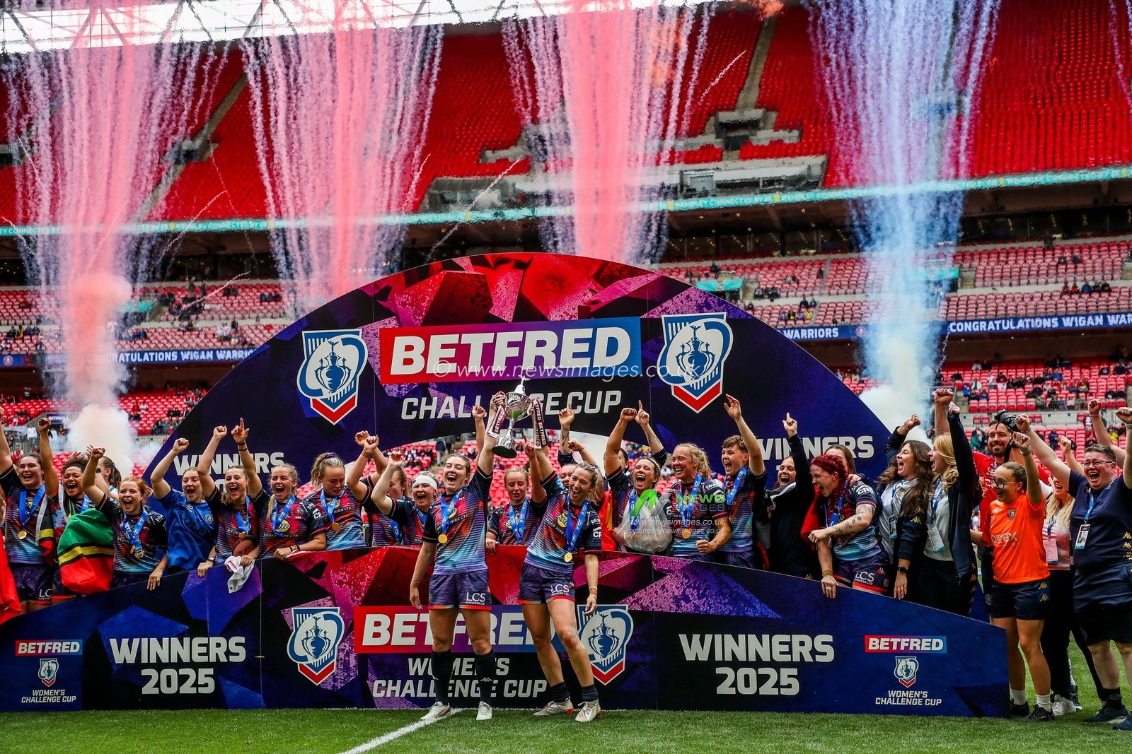 Wigan Warriors lift the Challenge Cup after the teams victory following the Betfred Women's Challenge Cup Final St Helens vs Wigan Warriors at Wembley Stadium, London, United Kingdom, 7th June 2025

(Photo by Izzy Poles/News Images)