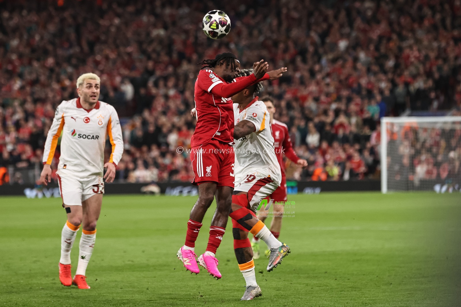 Jeremie Frimpong of Liverpool and Mario Lemina of Galatasaray battle for the ball during the UEFA Champions League last 16 second leg match Liverpool vs Galatasaray at Anfield, Liverpool, United Kingdom on 18 March 2026

(Photo by Alfie Cosgrove/News Images)