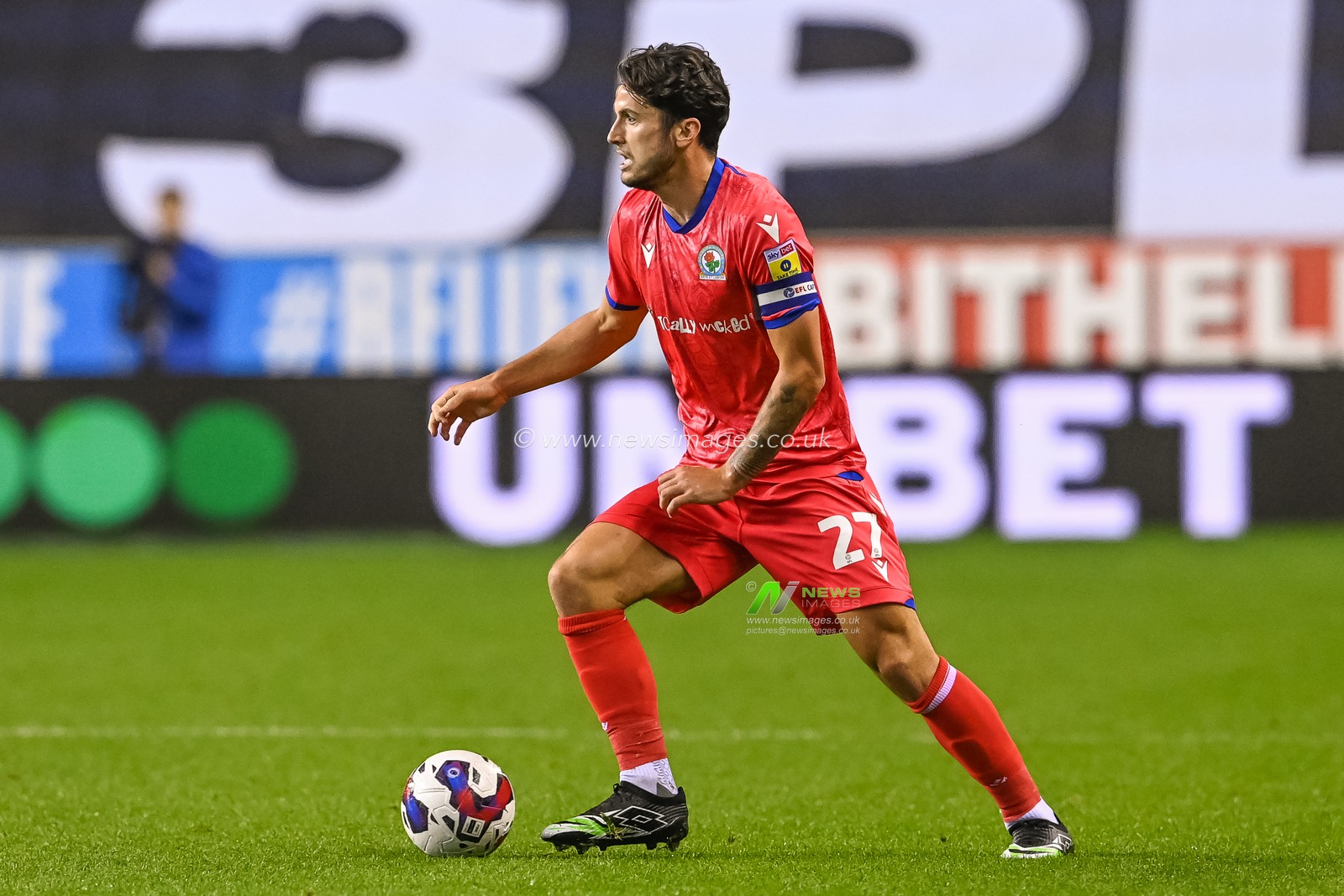Lewis Travis #27 of Blackburn Rovers in action during the Sky Bet Championship match Wigan Athletic vs Blackburn Rovers at DW Stadium, Wigan, United Kingdom, 11th October 2022

(Photo by Craig Thomas/News Images)