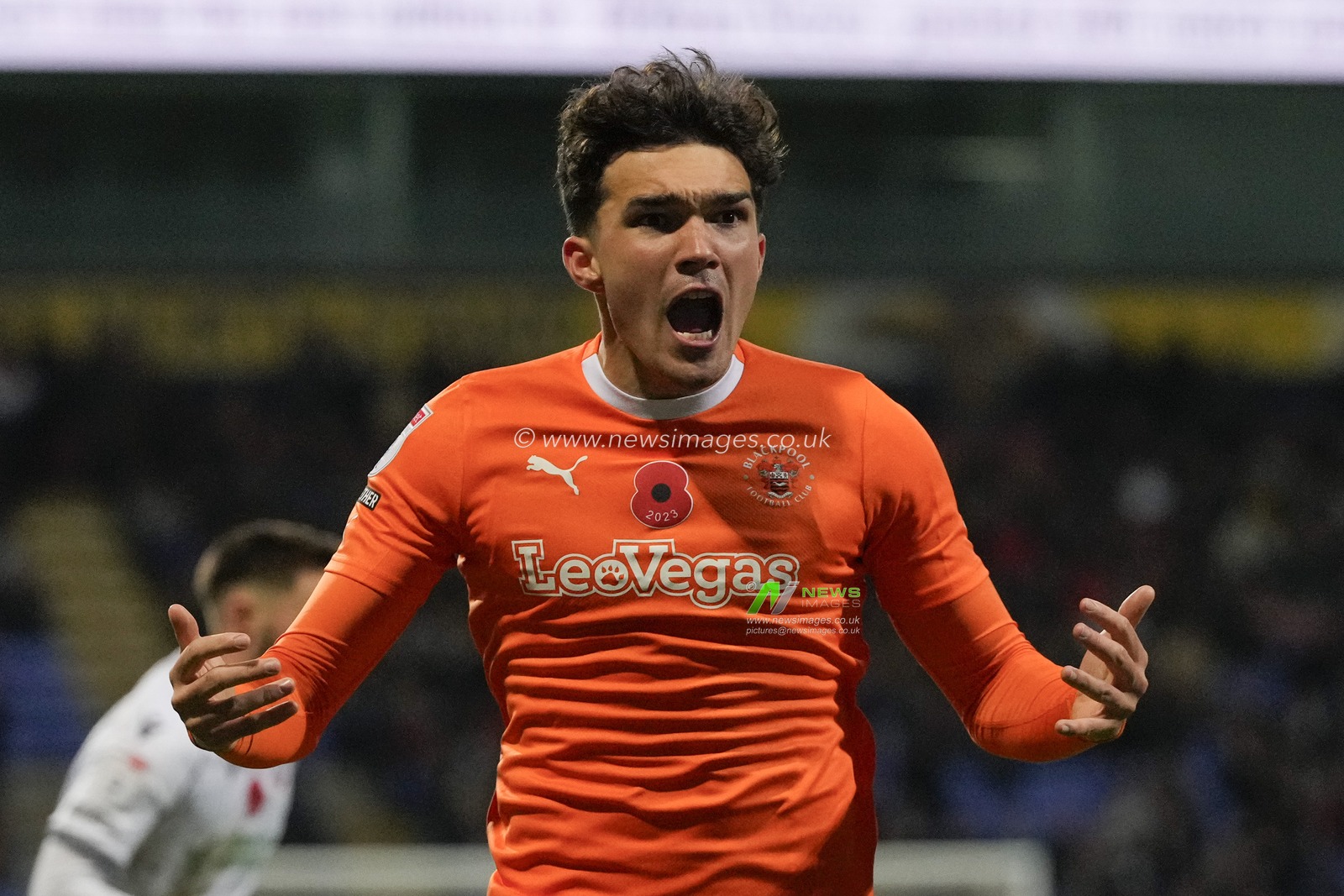 Kyle Joseph #9 of Blackpool encourages the fans during the Sky Bet League 1 match Bolton Wanderers vs Blackpool at University of Bolton Stadium, Bolton, United Kingdom, 11th November 2023

(Photo by Steve Flynn/News Images)