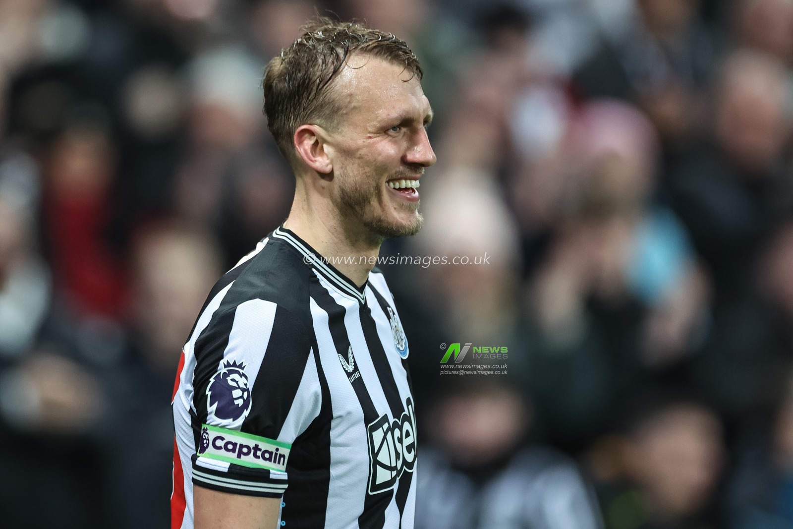 Dan Burn of Newcastle United wearing the captainâ€™s armband during the Premier League match Newcastle United vs Everton at St. James's Park, Newcastle, United Kingdom, 2nd April 2024

(Photo by Mark Cosgrove/News Images)