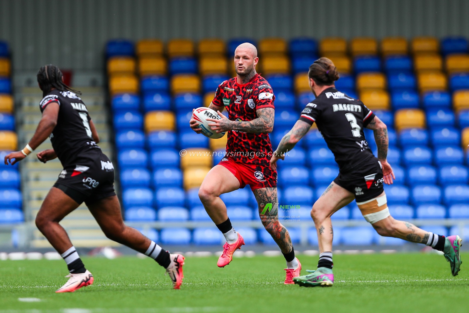 Nathan Wilde of Leigh Leopards runs with the ball during the Betfred Super League Round 23 match London Broncos vs Leigh Leopards at Plough Lane, Wimbledon, United Kingdom, 25th August 2024

(Photo by Izzy Poles/News Images)