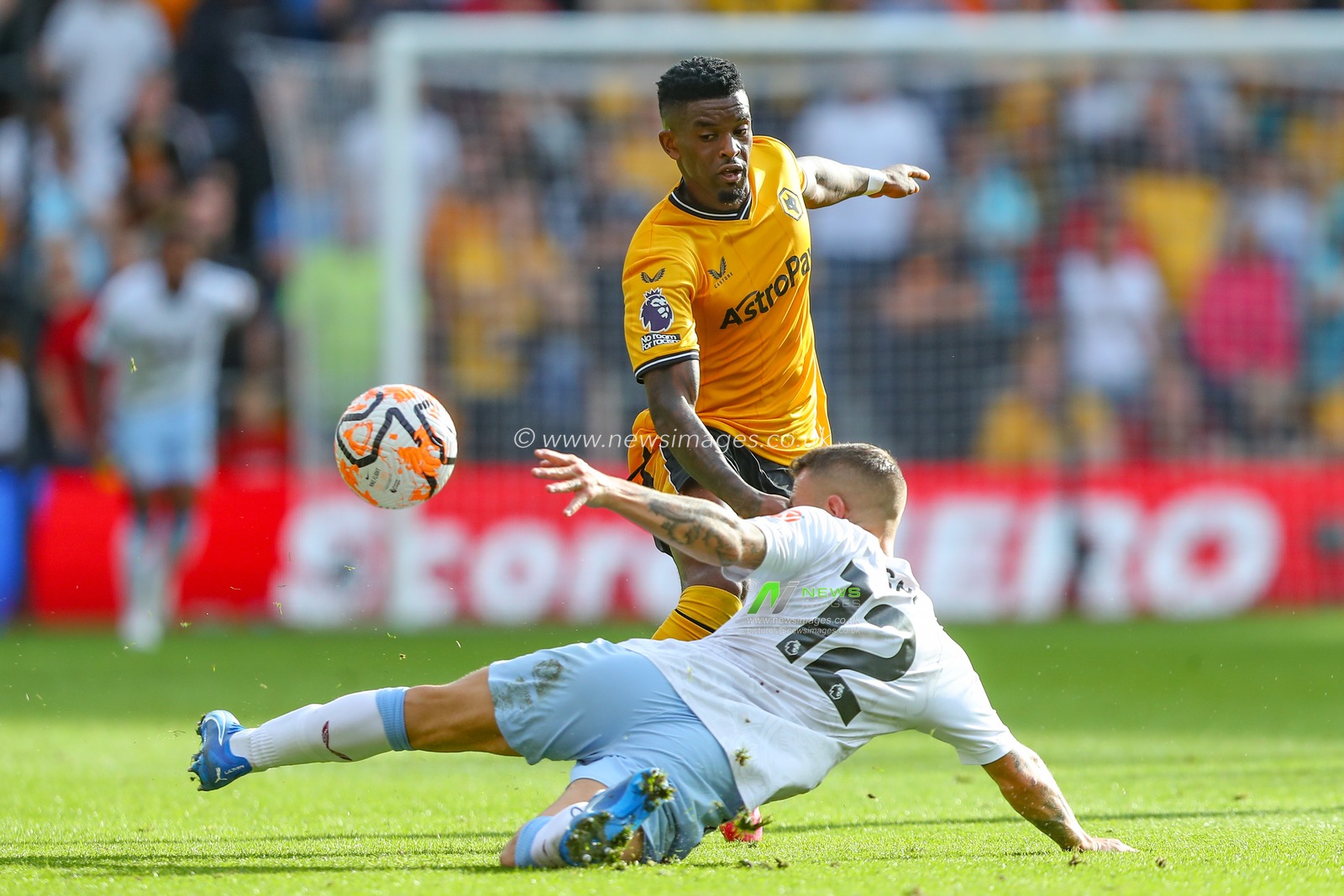 Lucas Digne #12 of Aston Villa tackles NÃ©lson Semedo #22 of Wolverhampton Wanderers during the Premier League match Wolverhampton Wanderers vs Aston Villa at Molineux, Wolverhampton, United Kingdom, 8th October 2023

(Photo by Gareth Evans/News Images)