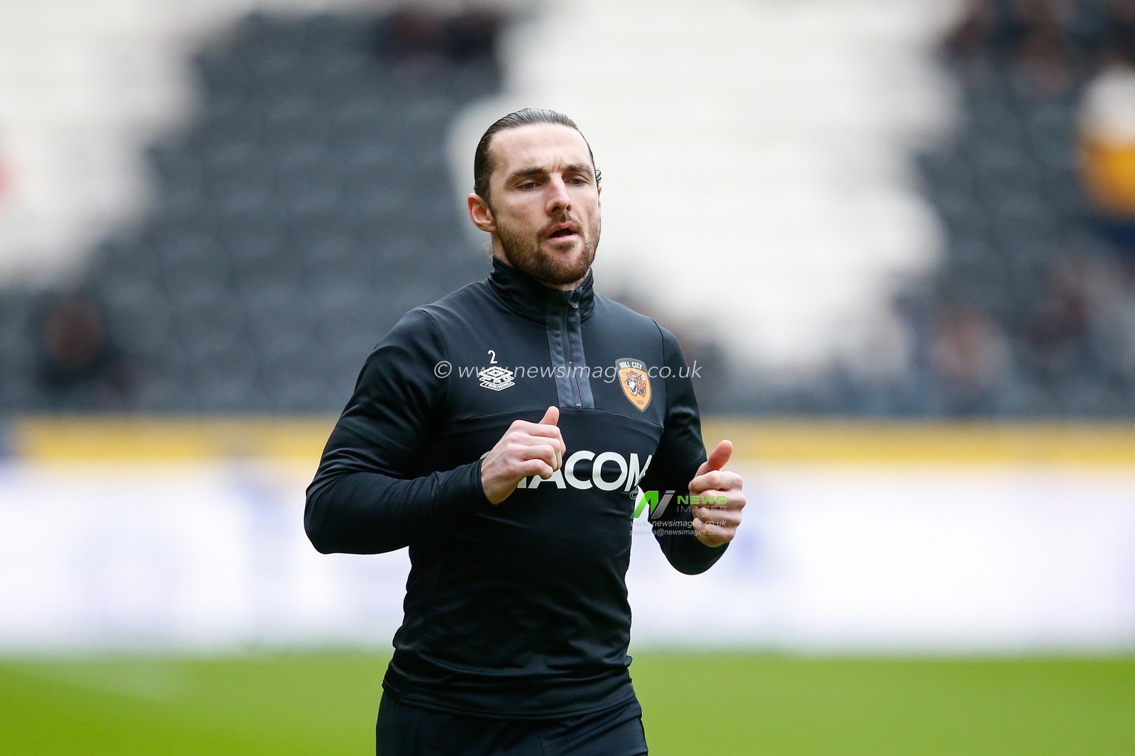 Lewie Coyle #2 of Hull City warms up before the Sky Bet Championship match Hull City vs Queens Park Rangers at MKM Stadium, Hull, United Kingdom, 28th January 2023

(Photo by Ben Early/News Images)