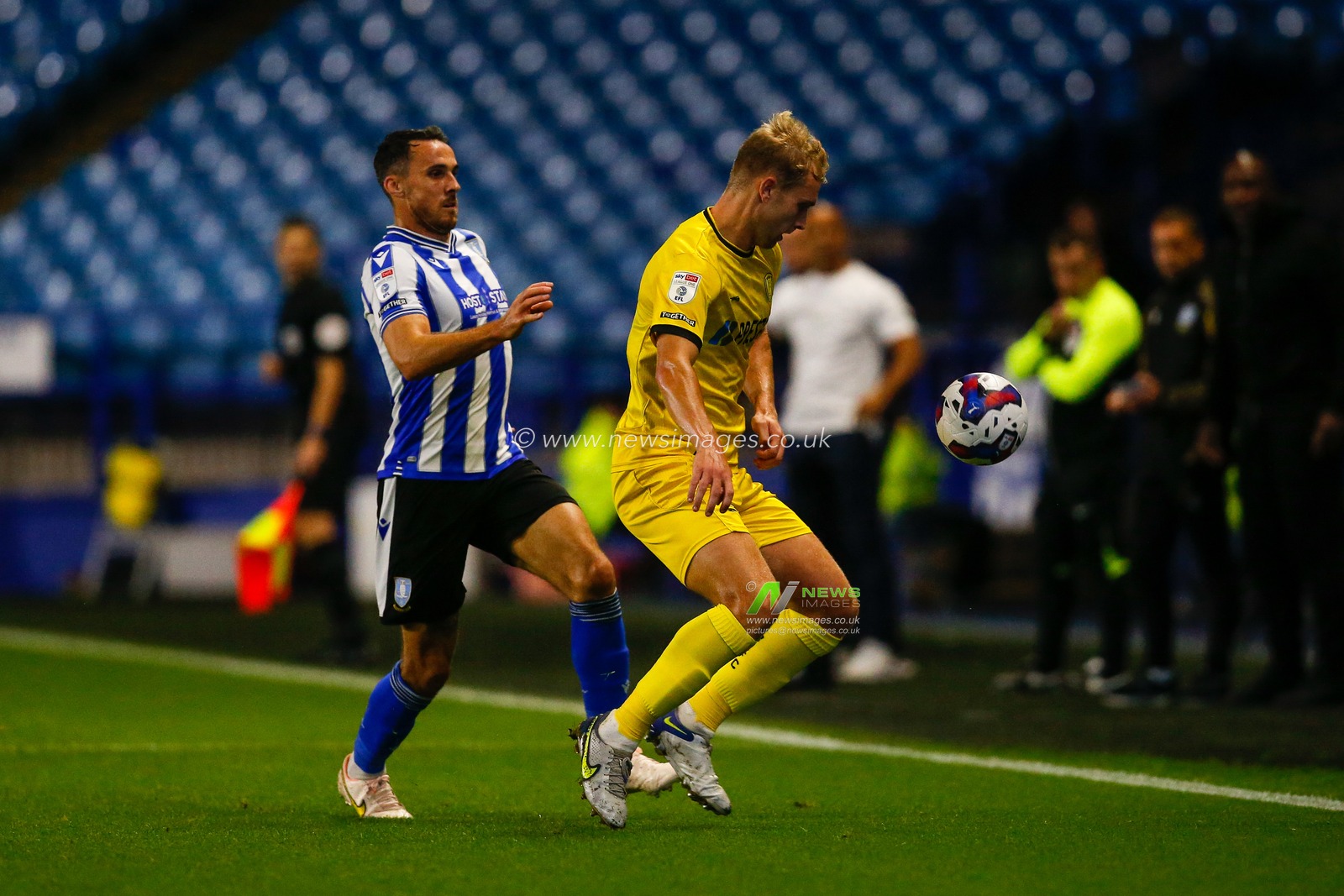Lee Gregory #9 of Sheffield Wednesday and Sam Hughes #5 of Burton Albion during the Papa John's Trophy match Sheffield Wednesday vs Burton Albion at Hillsborough, Sheffield, United Kingdom, 20th September 2022

(Photo by Ben Early/News Images)