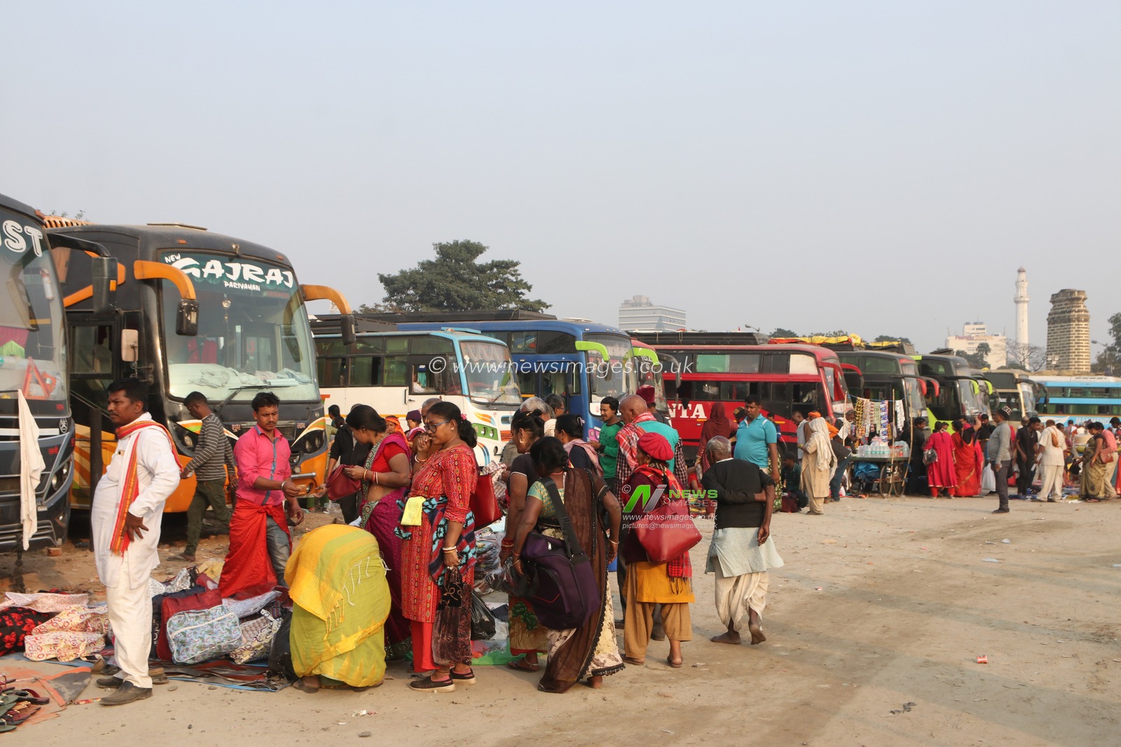Pilgrims at a Gangasagar mela transit camp in Kolkata, India, on January 11, 2025. Thousands of Hindu pilgrims prepare to take the annual holy dip at Gangasagar, where the Ganges River meets the Bay of Bengal, on the auspicious day of the Makar Sankranti festival, which falls on January 14..Picture by Debajyoti Chakraborty.(Photo: Debajyoti Chakraborty/News Images)
