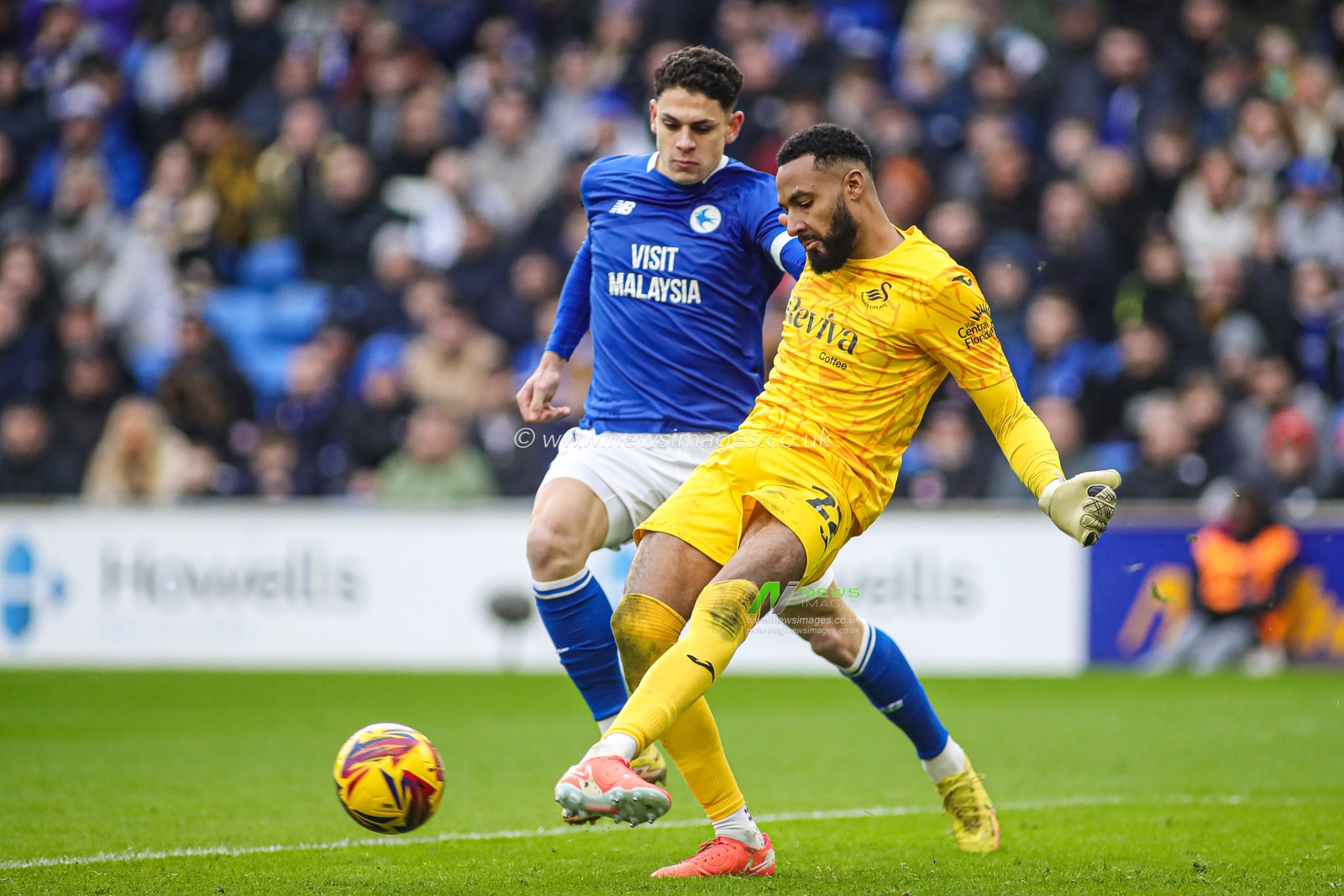 Yousef Salech of Cardiff City closes down Swansea City goalkeeper Lawrence Vigourouxduring the Sky Bet Championship match Cardiff City vs Swansea City at Cardiff City Stadium, Cardiff, United Kingdom, 18th January 2025

(Photo by Andrew Lewis/News Images)