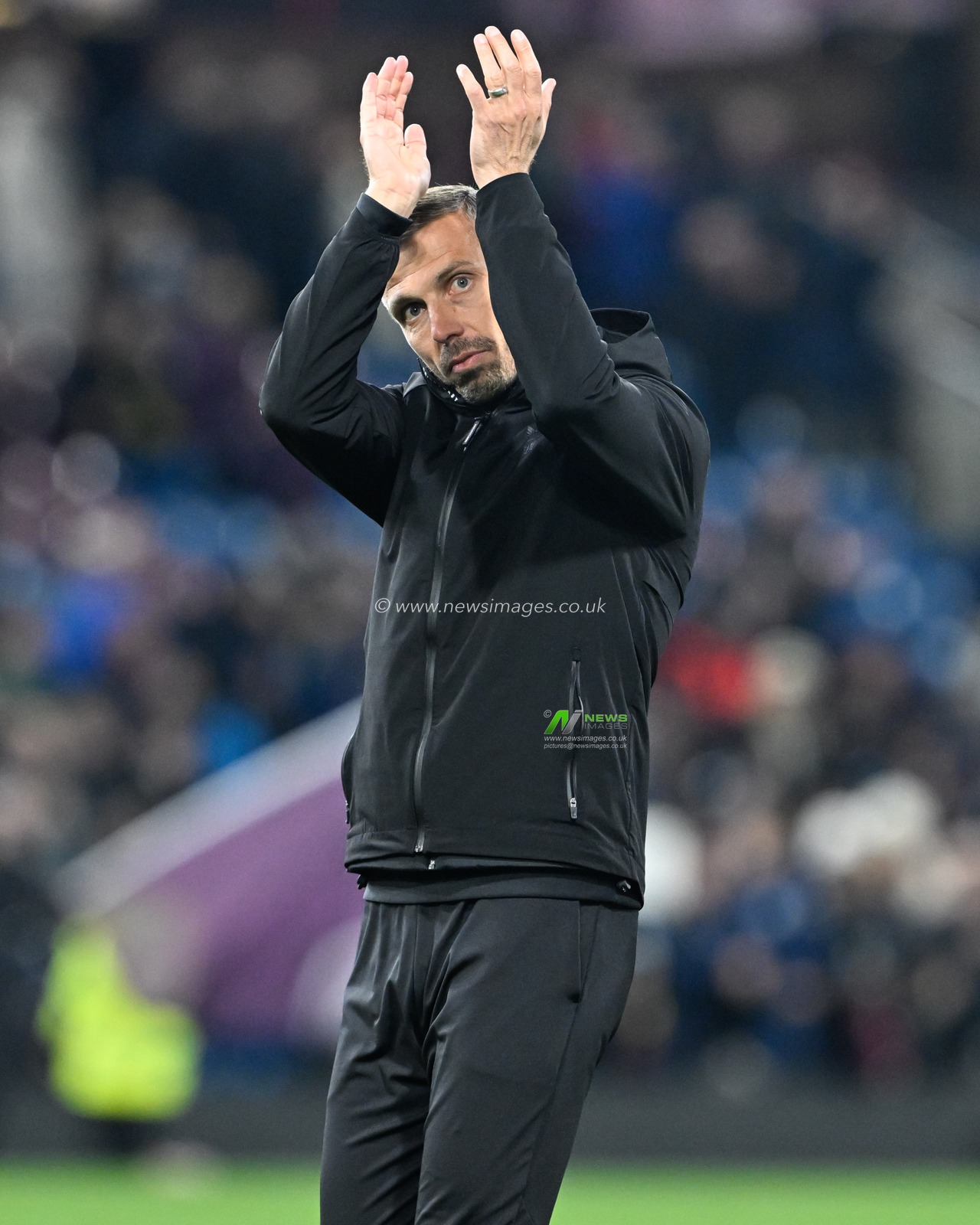 Gary O'Neil manager of Wolverhampton Wanderers claps fans at full time, during the Premier League match Burnley vs Wolverhampton Wanderers at Turf Moor, Burnley, United Kingdom, 2nd April 2024

(Photo by Cody Froggatt/News Images)