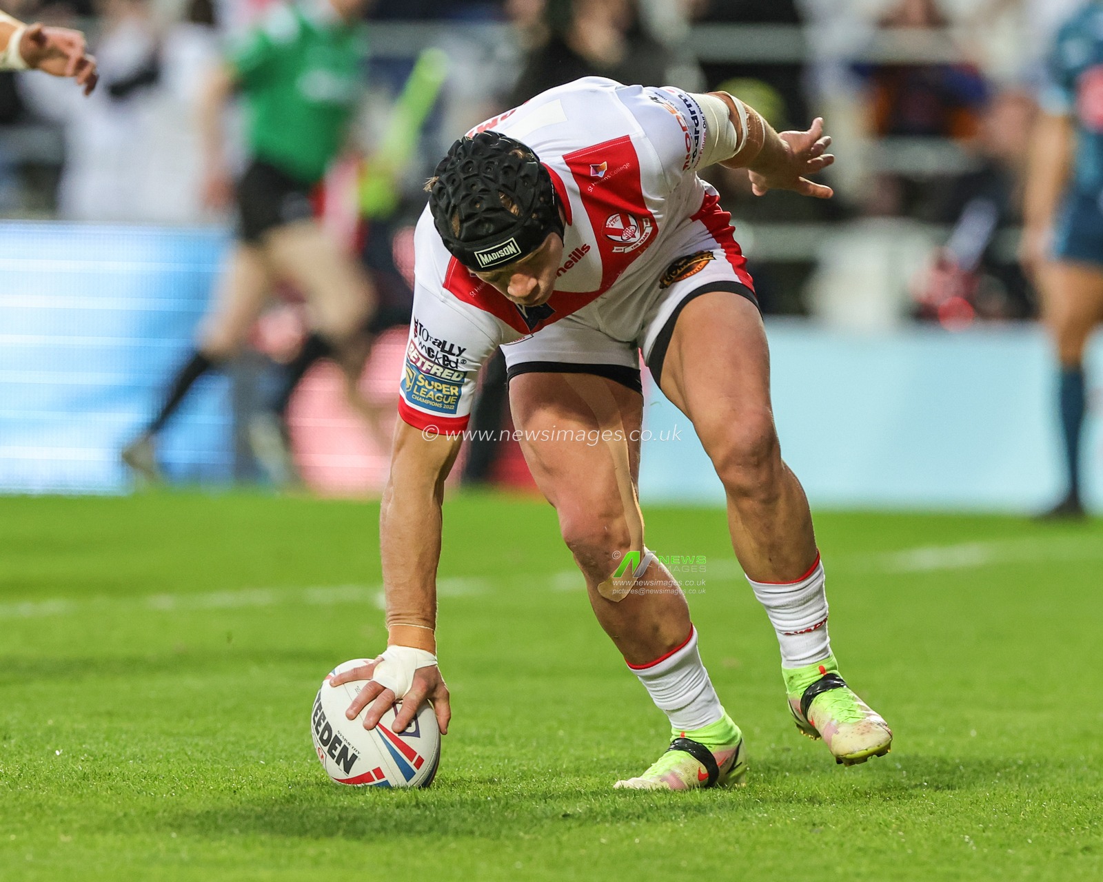 Jonny Lomax #6 of St Helens goes over for a try during the Betfred Super League Round 10 match St Helens vs Warrington Wolves at Totally Wicked Stadium, St Helens, United Kingdom, 20th April 2023

(Photo by Mark Cosgrove/News Images)