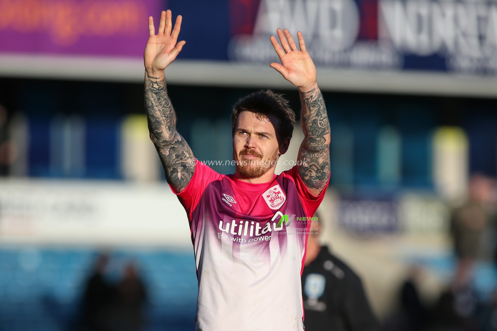Danny Ward #25 of Huddersfield Town acknowledges the fans at the final whistle during the Sky Bet Championship match Millwall vs Huddersfield Town at The Den, London, United Kingdom, 18th March 2023

(Photo by Arron Gent/News Images)