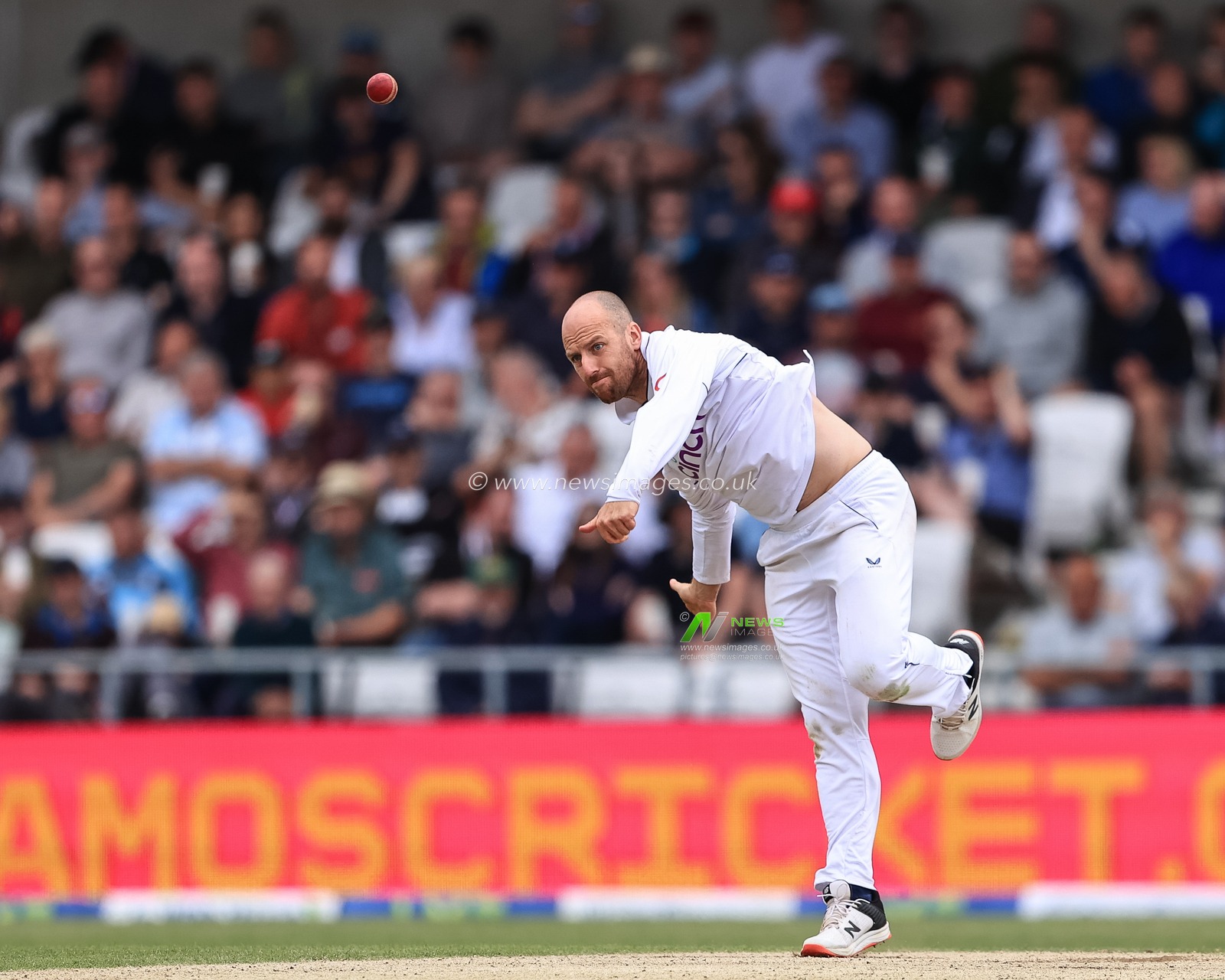 Jack Leach of England delivers the ball to Kane Williamson of New Zealand