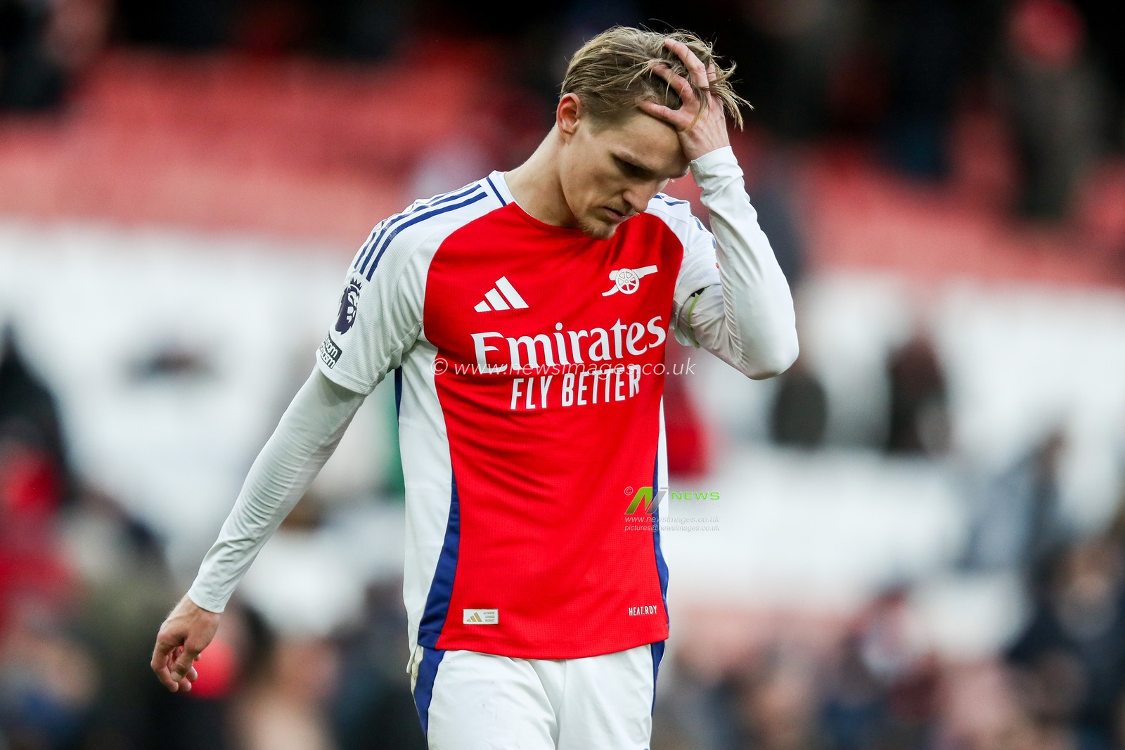 Martin Odegaard of Arsenal looks dejected after the teams defeat following the Premier League match Arsenal vs West Ham United at Emirates Stadium, London, United Kingdom, 22nd February 2025

(Photo by Izzy Poles/News Images)