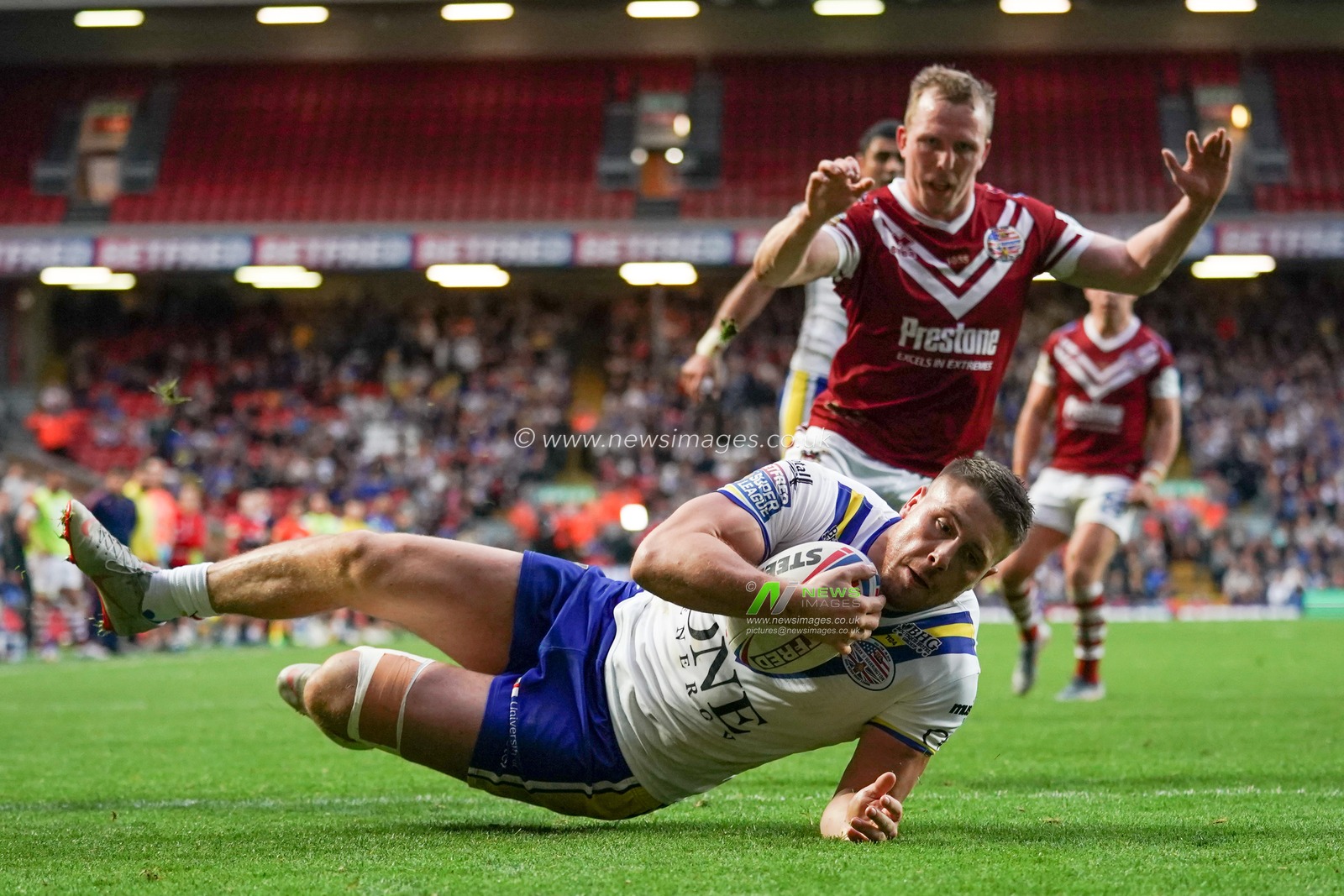 Warrington Wolves's Tom Lineham in action during todays match


25th May 2019 , Anfield Stadium, Liverpool, England; Dacia Magic Weekend, Betfred Super League Round 16, Wigan Warriors vs Warrington Wolves ; 

Credit: Terry Donnelly/News Images
