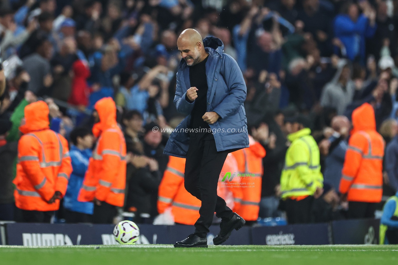 Pep Guardiola manager of Manchester City celebrates his sides goal to make it 2-2 during the Premier League match Manchester City vs Arsenal at Etihad Stadium, Manchester, United Kingdom, 22nd September 2024

(Photo by Mark Cosgrove/News Images)