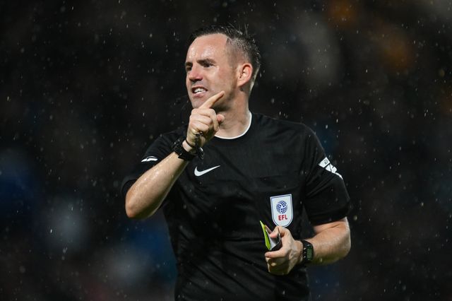 Referee Ross Joyce gives instructions during the Carabao Cup match Stockport County vs Blackburn Rovers at Edgeley Park Stadium, Stockport, United Kingdom, 13th August 2024

(Photo by Craig Thomas/News Images)