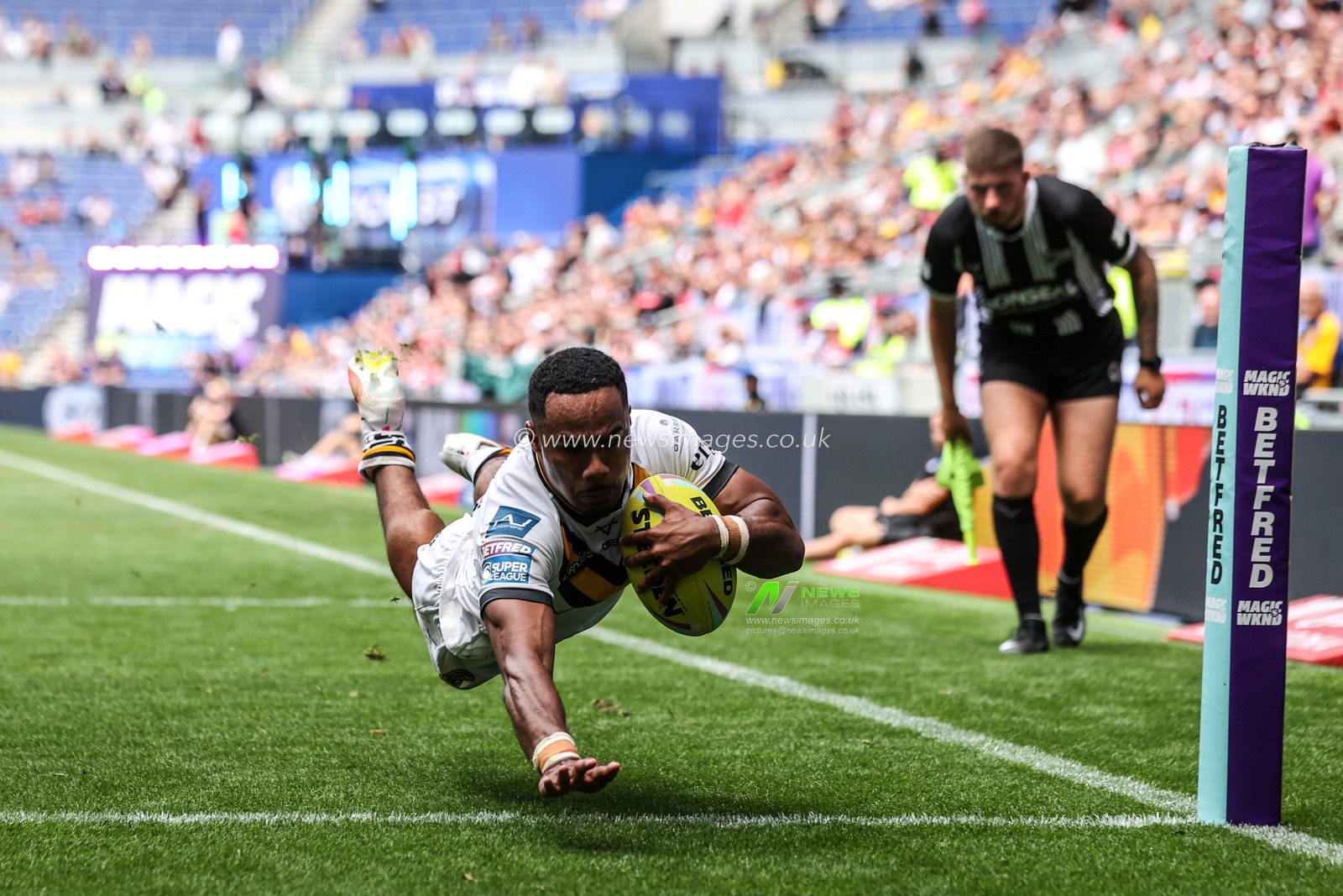 Jason Qareqare of Castleford Tigers goes over for a try during the Betfred Super League Magic Weekend match Wakefield Trinity vs Castleford Tigers at Hill Dickinson Stadium, Liverpool, United Kingdom on 05 July 2026

(Photo by Alfie Cosgrove/News Images)