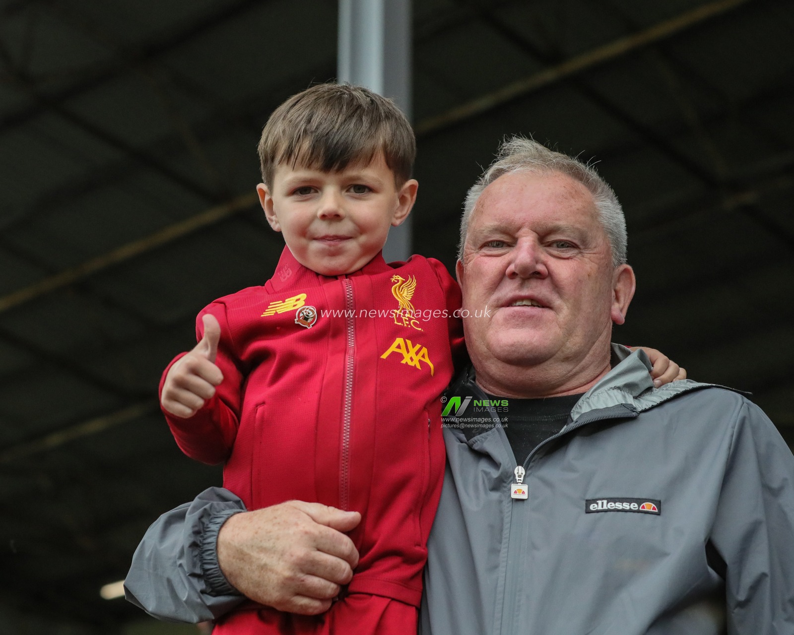 31st August 2019, Turf Moor, Burnley, England ; Premier League Football, Burnley vs Liverpool : A young Liverpool fan in the crowd to watch his team

Credit: Mark Cosgrove/News Images

English Football League images are subject to DataCo Licence