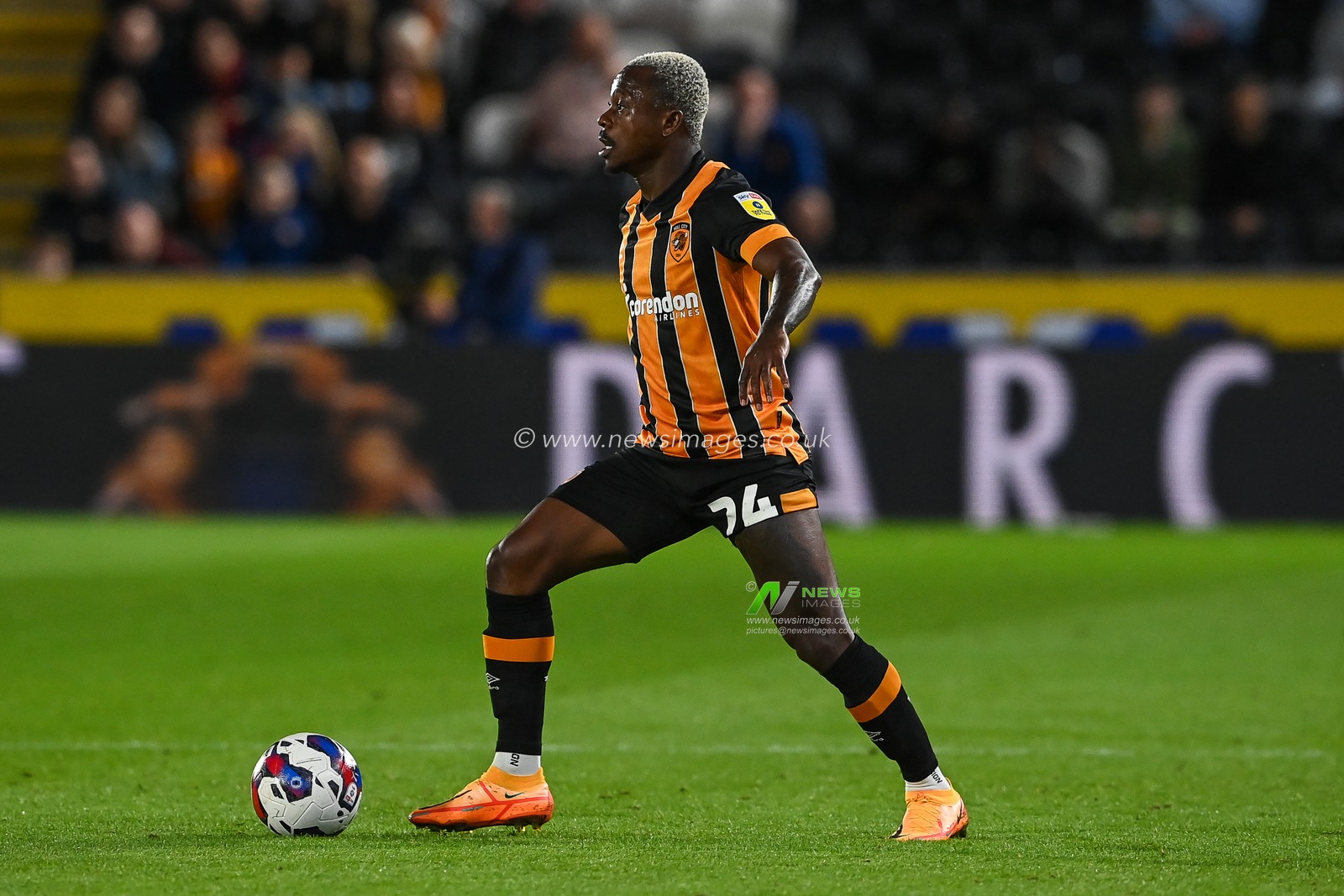 Jean MichaÃ«l Seri #24 of Hull City in action during the Sky Bet Championship match Hull City vs Stoke City at MKM Stadium, Hull, United Kingdom, 13th September 2022

(Photo by Craig Thomas/News Images)