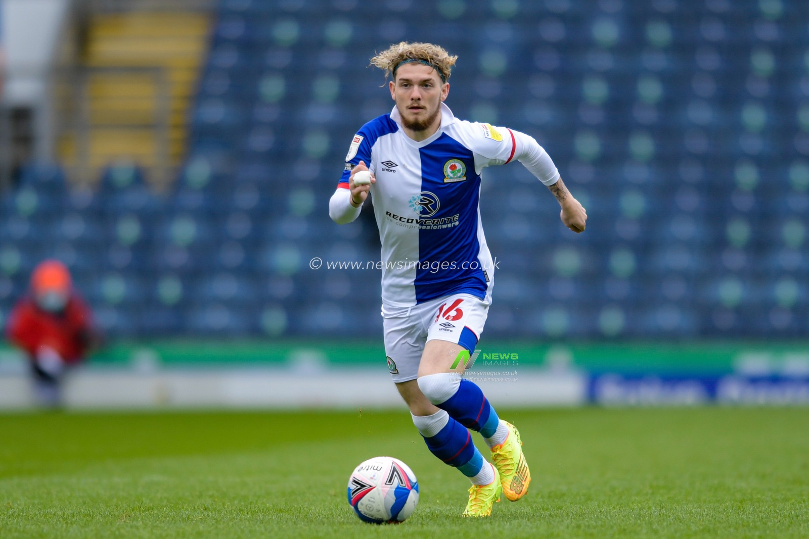 Harvey Elliott #16 of Blackburn Rovers runs forward with the ball