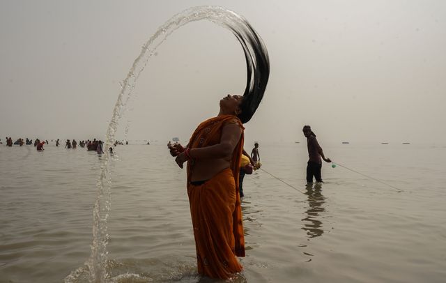  Indian Hindu devotees take a holy bath before performing rituals at the Gangasagar Island, some 150 kms south of Kolkata, on January 13 2025.Pictures by Debajyoti Chakraborty..                              (Photo: Debajyoti Chakraborty/News Images)