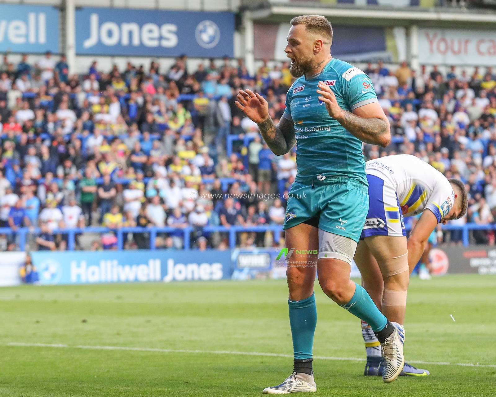 Blake Austin #6 of Leeds Rhinos appeals to the referee during the Betfred Super League Round 17 match Warrington Wolves vs Leeds Rhinos at Halliwell Jones Stadium, Warrington, United Kingdom, 29th June 2023

(Photo by Gareth Evans/News Images)