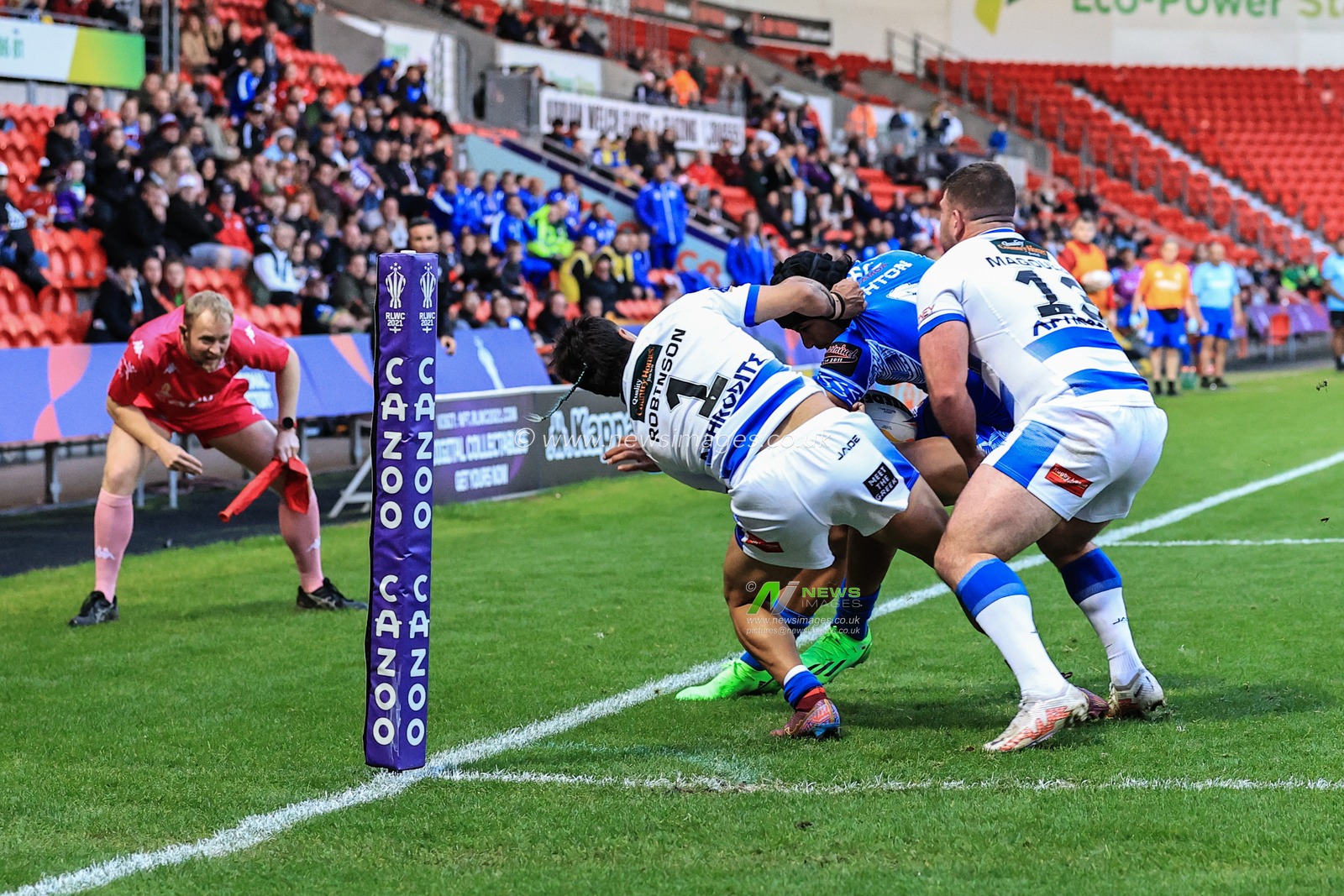 Chaise Robinson of Greece and Billy Magoulias of Greece stop Stephen Crichton of Samoa from going over during the Rugby League World Cup 2021 Cup Group A match Samoa vs Greece at Eco-Power Stadium, Doncaster, United Kingdom, 23rd October 2022

(Photo by Mark Cosgrove/News Images)