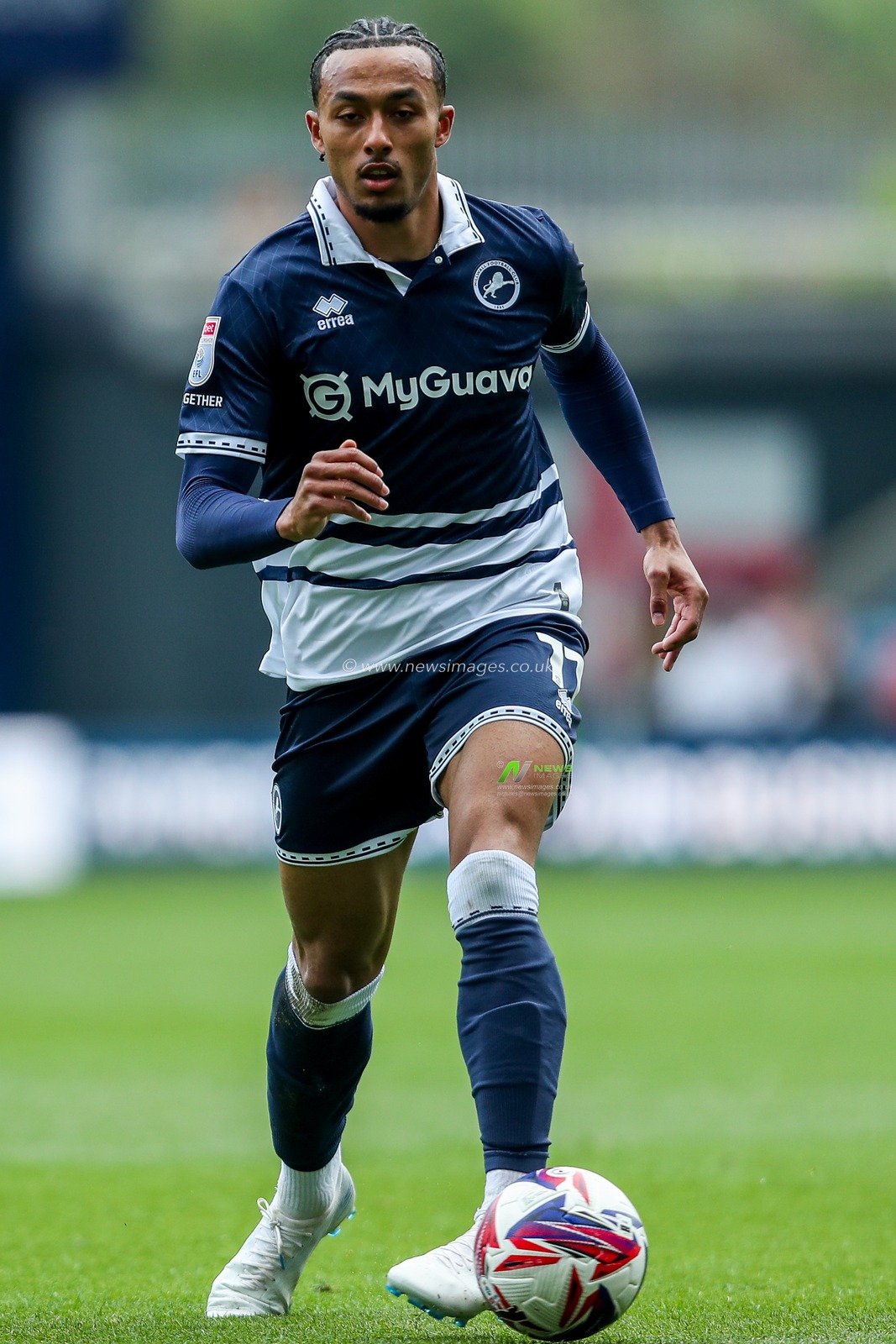 Femi Azeez of Millwall runs with the ball during the Sky Bet Championship match Millwall vs Norwich City at The Den, London, United Kingdom, 21st April 2025

(Photo by Izzy Poles/News Images)