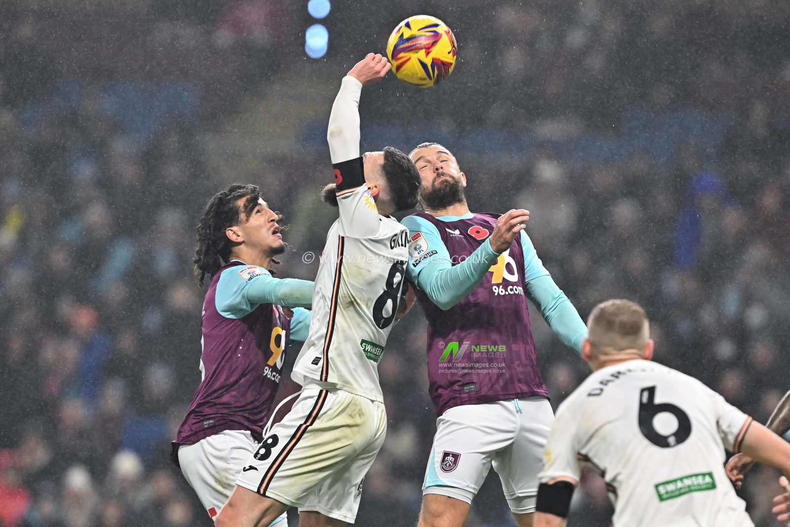 Matt Grimes of Swansea City handles the ball for a penalty for Burnley during the Sky Bet Championship match Burnley vs Swansea City at Turf Moor, Burnley, United Kingdom, 10th November 2024

(Photo by Cody Froggatt/News Images)