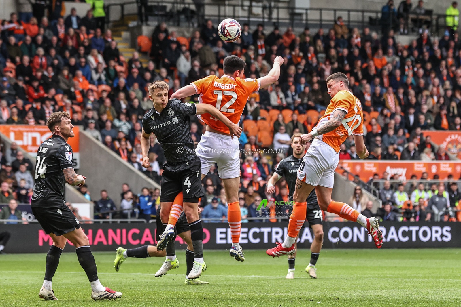 Oliver Casey of Blackpool heads on goal from a corner during the Sky Bet League 1 match Blackpool vs Wrexham at Bloomfield Road, Blackpool, United Kingdom, 21st April 2025

(Photo by Alfie Cosgrove/News Images)