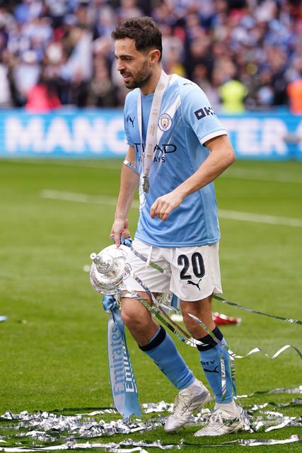 Bernardo Silva of Manchester City holds the fa cup trophy at full time during the Emirates FA Cup Final match Chelsea vs Manchester City at Wembley Stadium, London, United Kingdom on 16 May 2026

(Photo by Harvey Murphy/News Images)