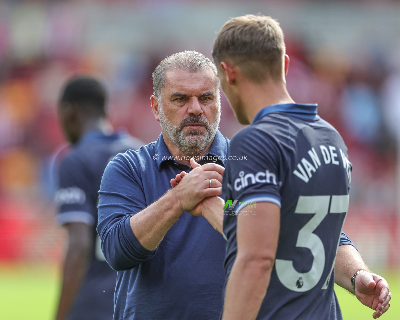 Ange Postecoglou head coach of Tottenham Hotspur shakes hands with Micky van de Ven Tottenham Hotspur after the final whistle during the Premier League match Brentford vs Tottenham Hotspur at Brentford Community Stadium, London, United Kingdom, 13th August 2023

(Photo by Mark Cosgrove/News Images)